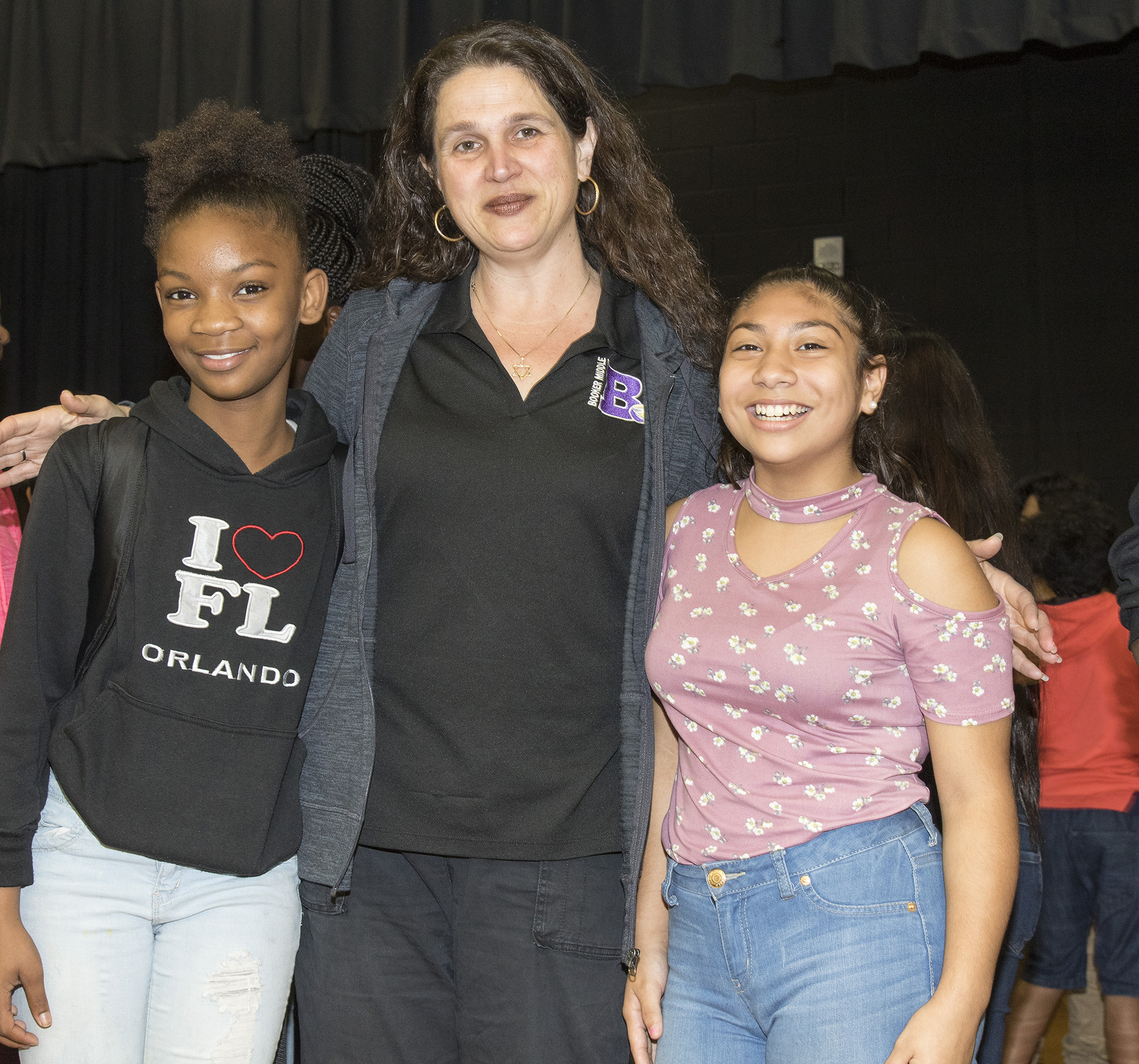 Allison Cohen poses with students after being named the middle school Teacher of the Year. 