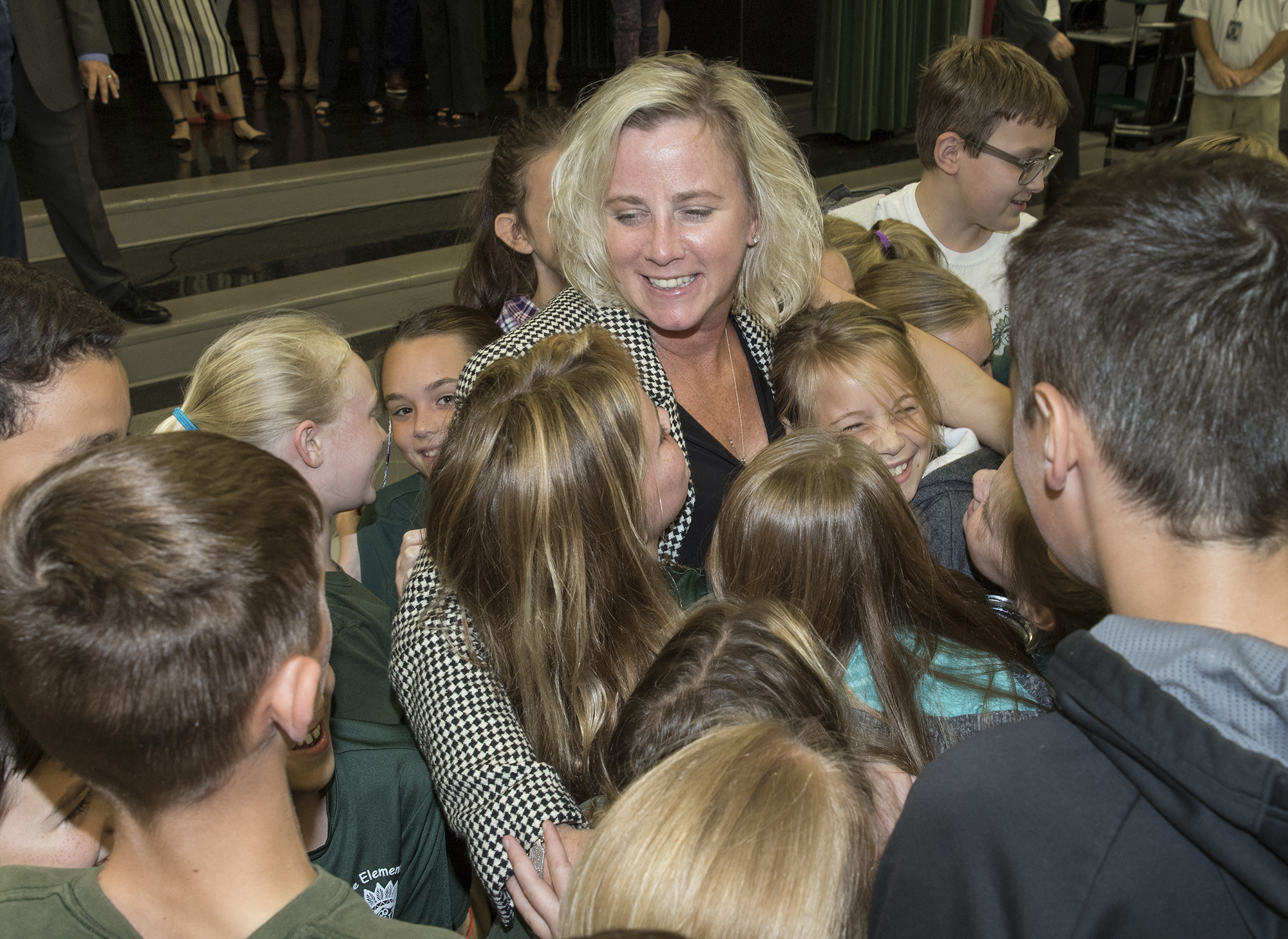 Bethany Burnett celebrates with students after being names the elementary school Teacher of the Year.