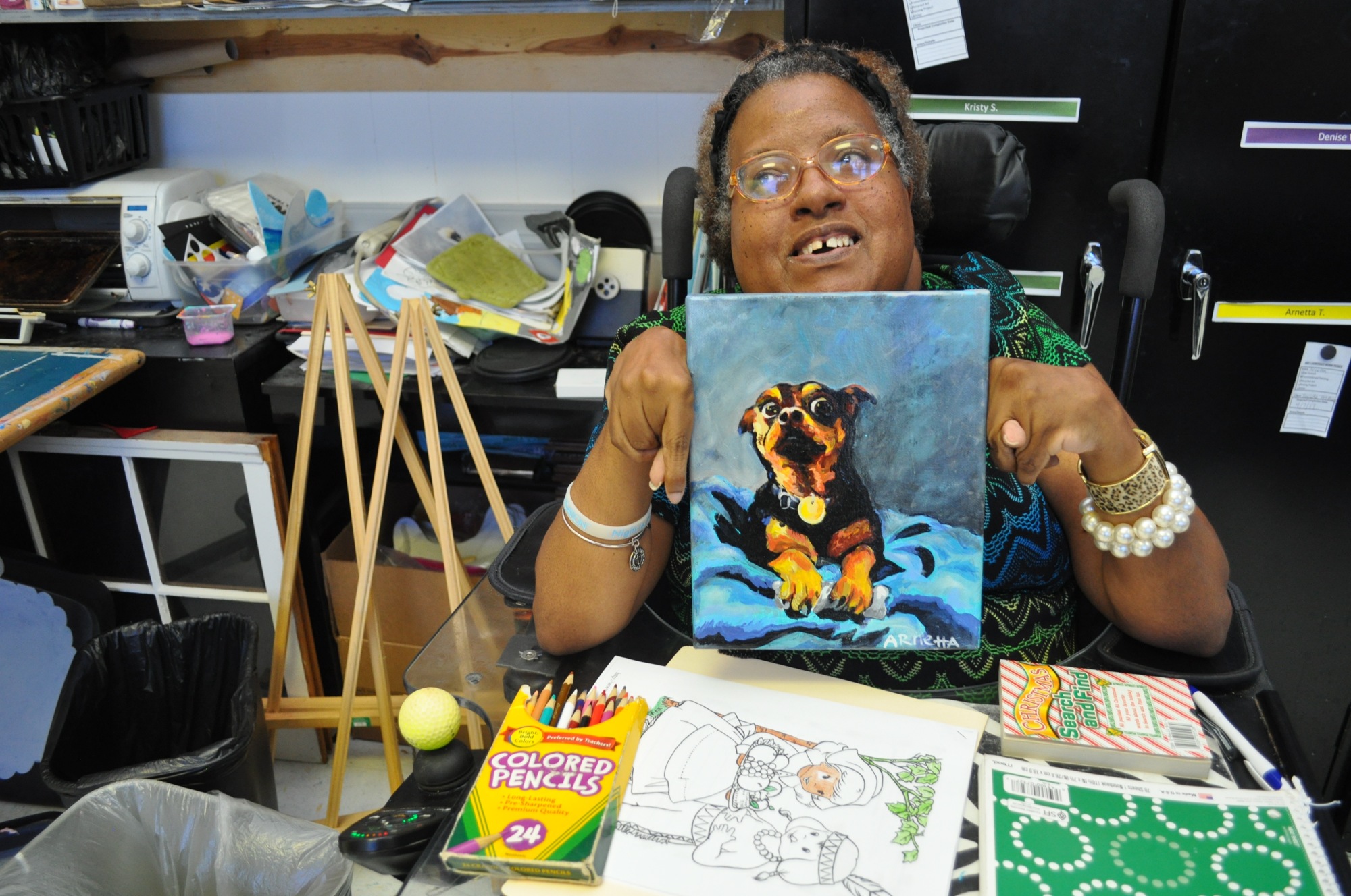 One of the program’s most accomplished artists, Arnetta, painted this canvas of instructor Viktoria Bridgeford’s dog.