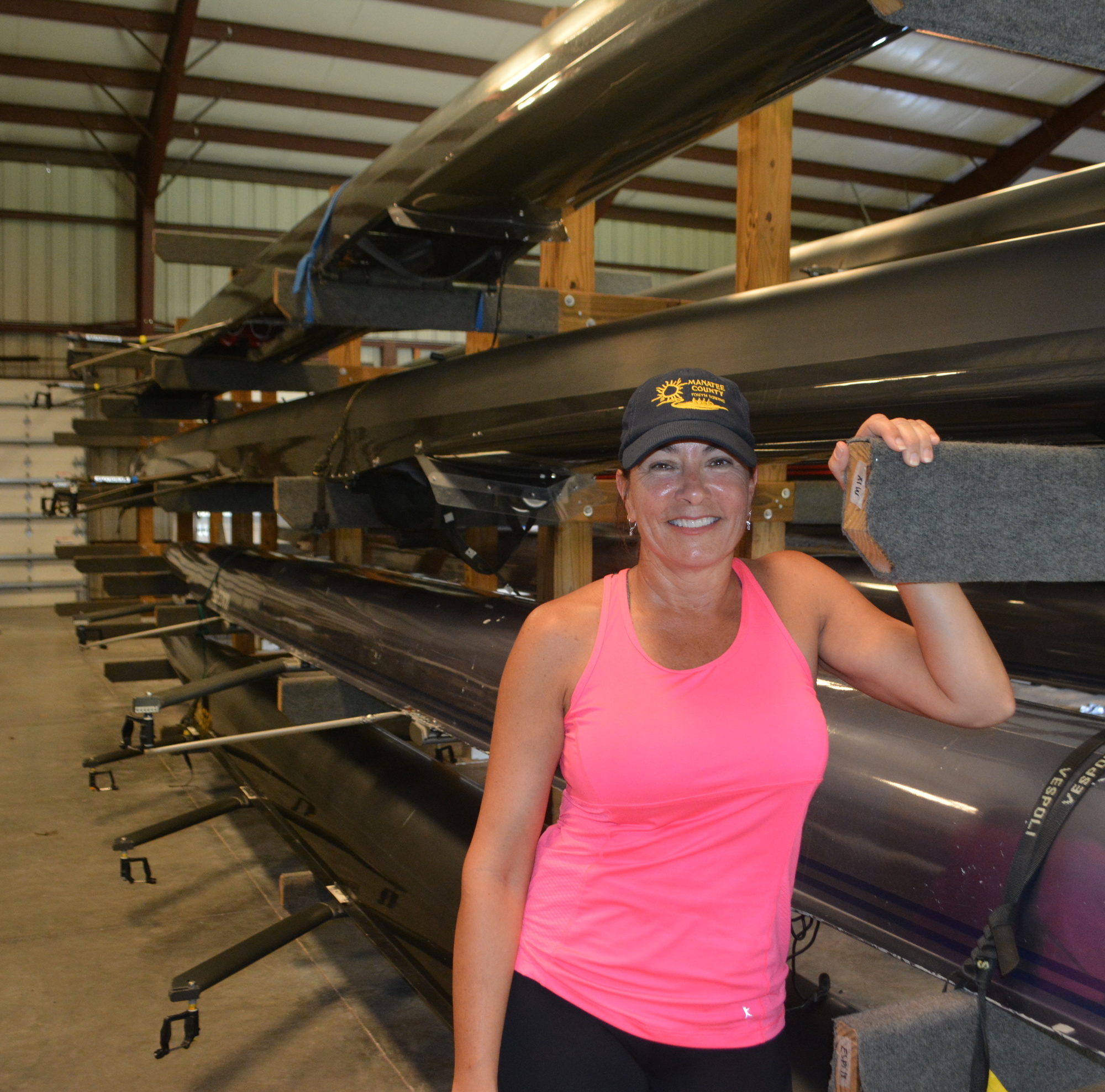 Trish Chastain, pictured at the Fort Hamer Park boathouse, wants Manatee County Youth Rowing to expand in the coming years. Photo via Jay Heater.