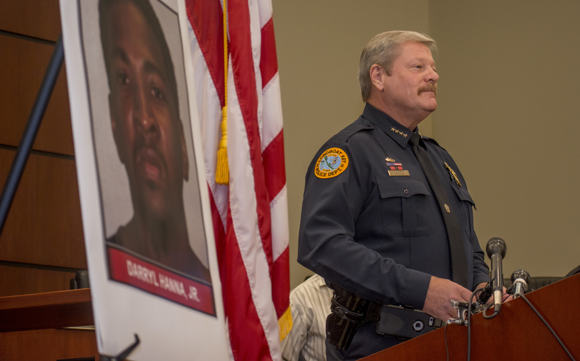 Longboat Police Chief Pete Cumming speaks during a press conference announcing the arrest Darryl Hanna. Jr.