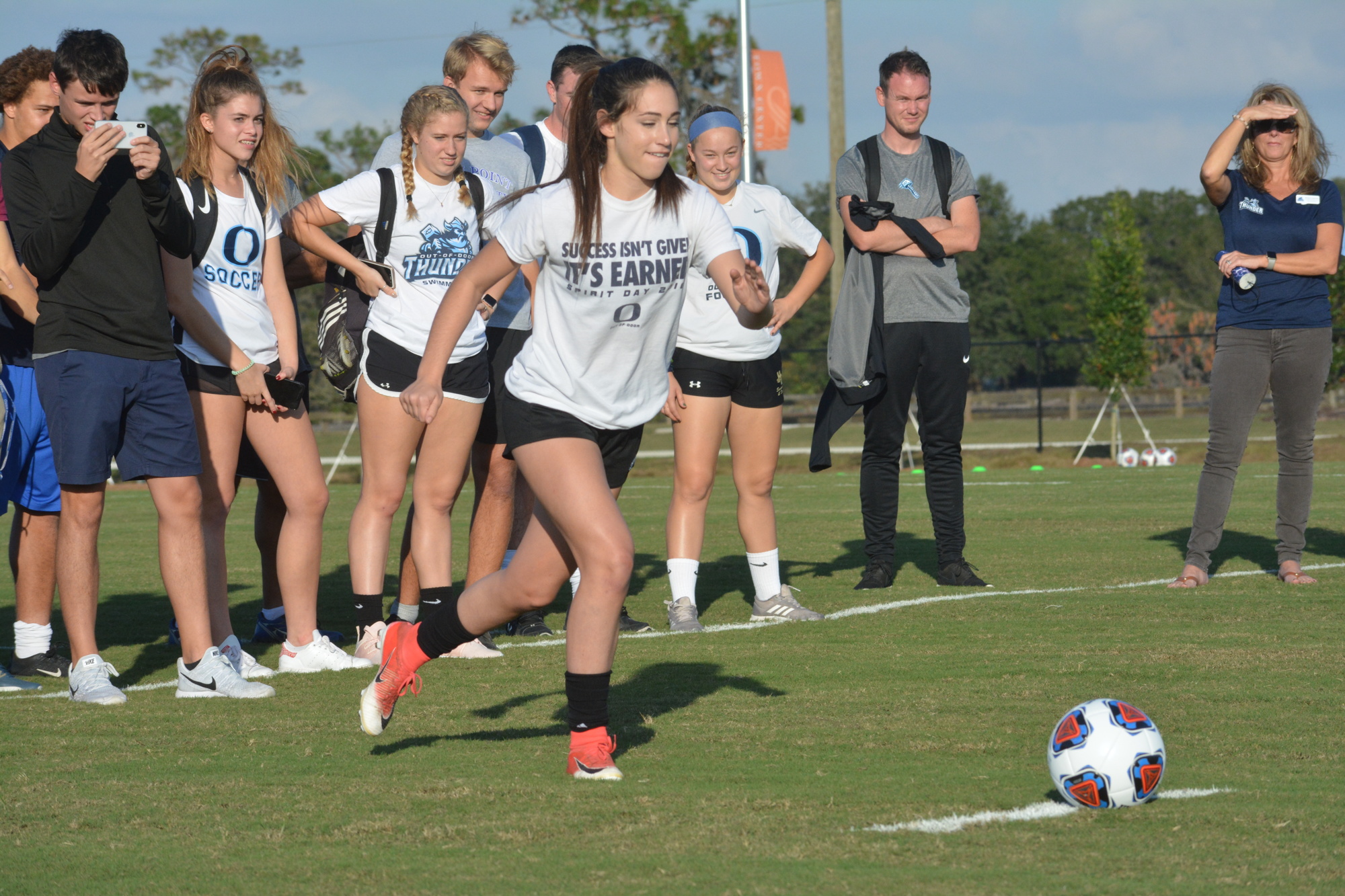 The Out-of-Door Academy girls soccer sophomore Natalie Gorji christens the school's practice facility with a penalty shot goal.