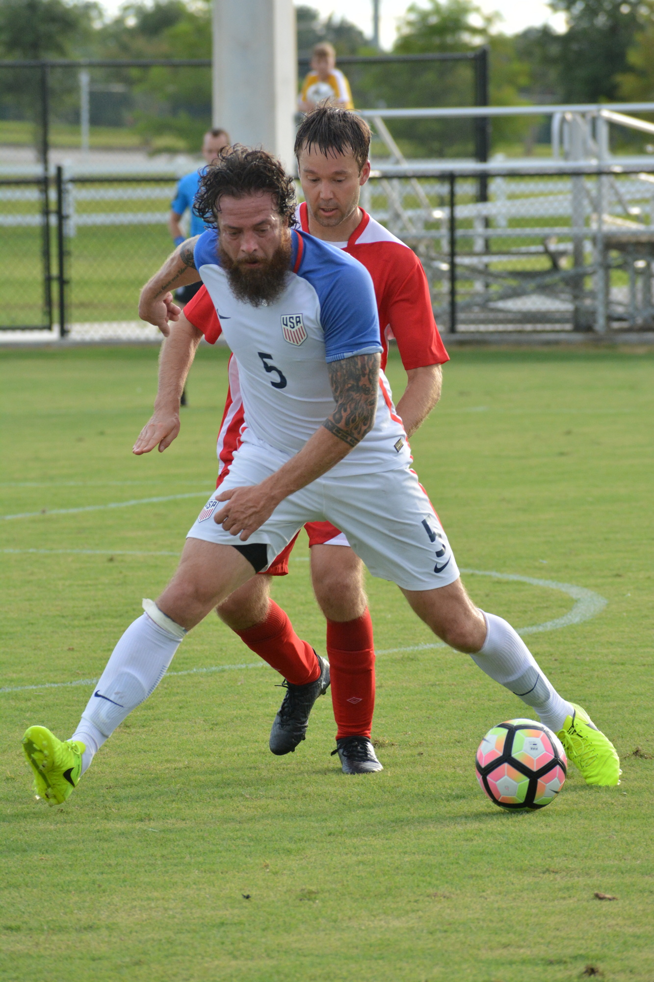 The U.S. Paralympic Soccer Team's Seth Jahn shields the ball from a Canadian defender during a July 21 friendly.  File photo.