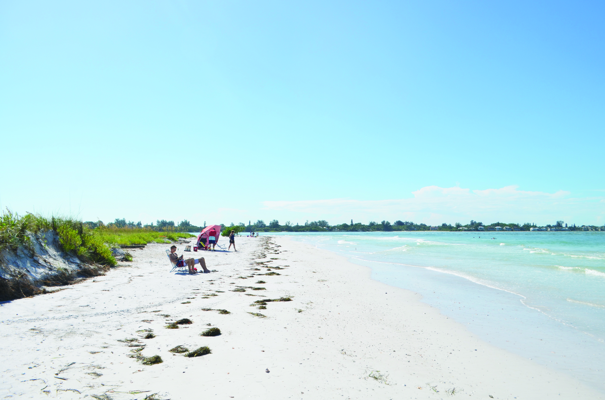 Beachgoers enjoy a stretch of Lido Key.