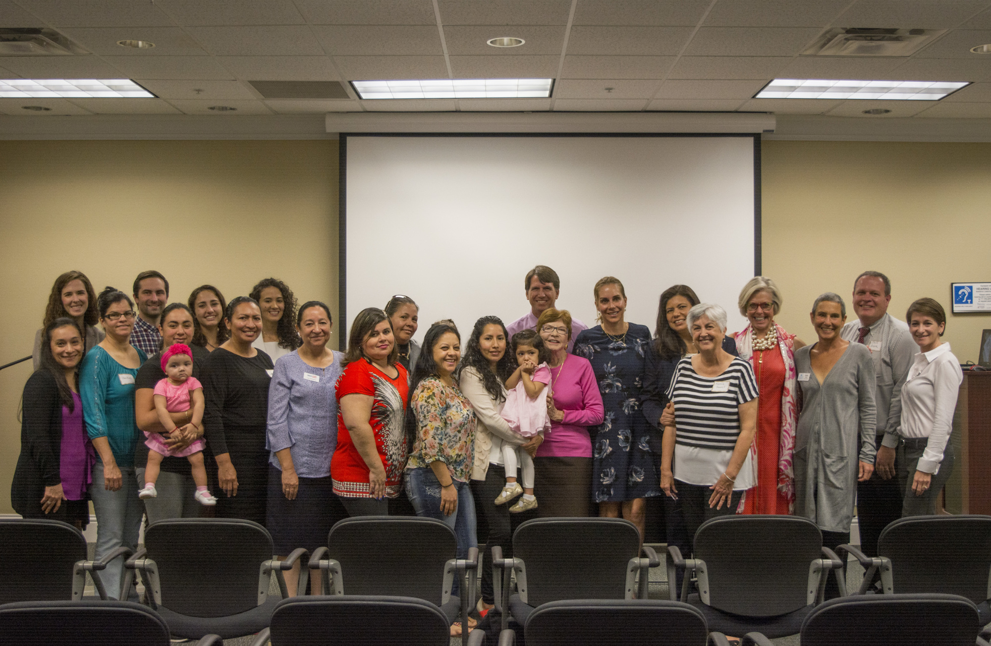 Community Foundation of Sarasota County and UnidosNow staff gathered with Families Together program participants to celebrate the success of the dual generational program.