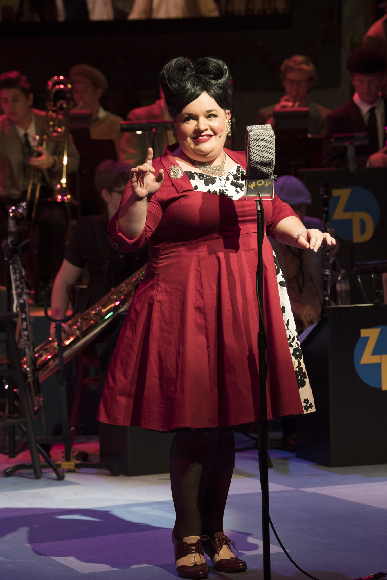 Debbi White performs a scene in “The 1940’s Radio Hour” at Players Mainstage. Photo by Cliff Roles