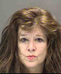 Police arrested Donna Betts, 62, after they said she pointed a riffle at Sarasota Crew rowers and coaches.