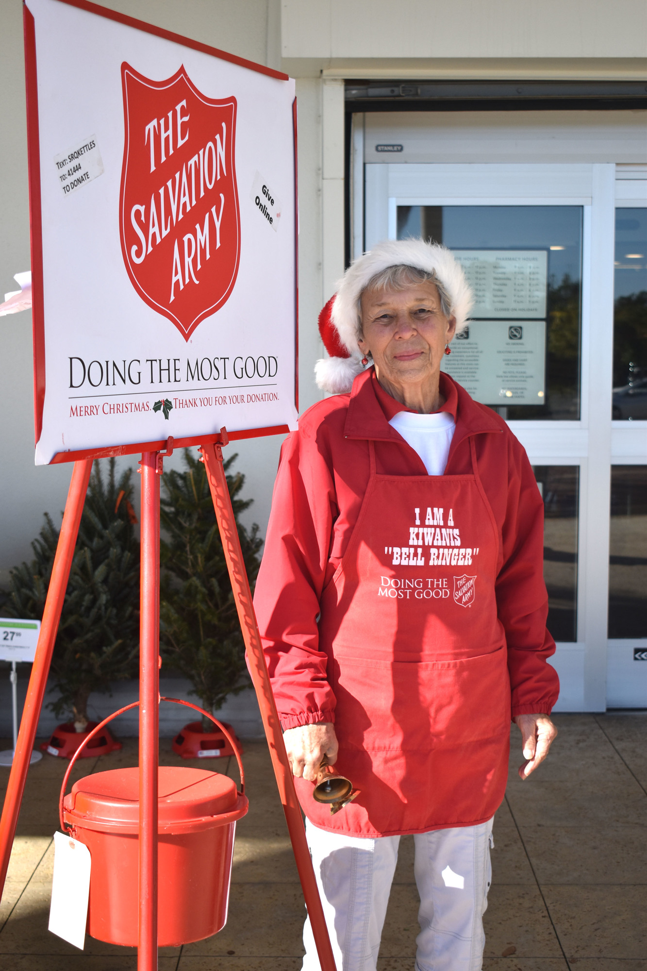 Jane Boehme rings the bell outside of Publix for the Longboat Key Kiwanis Club. 