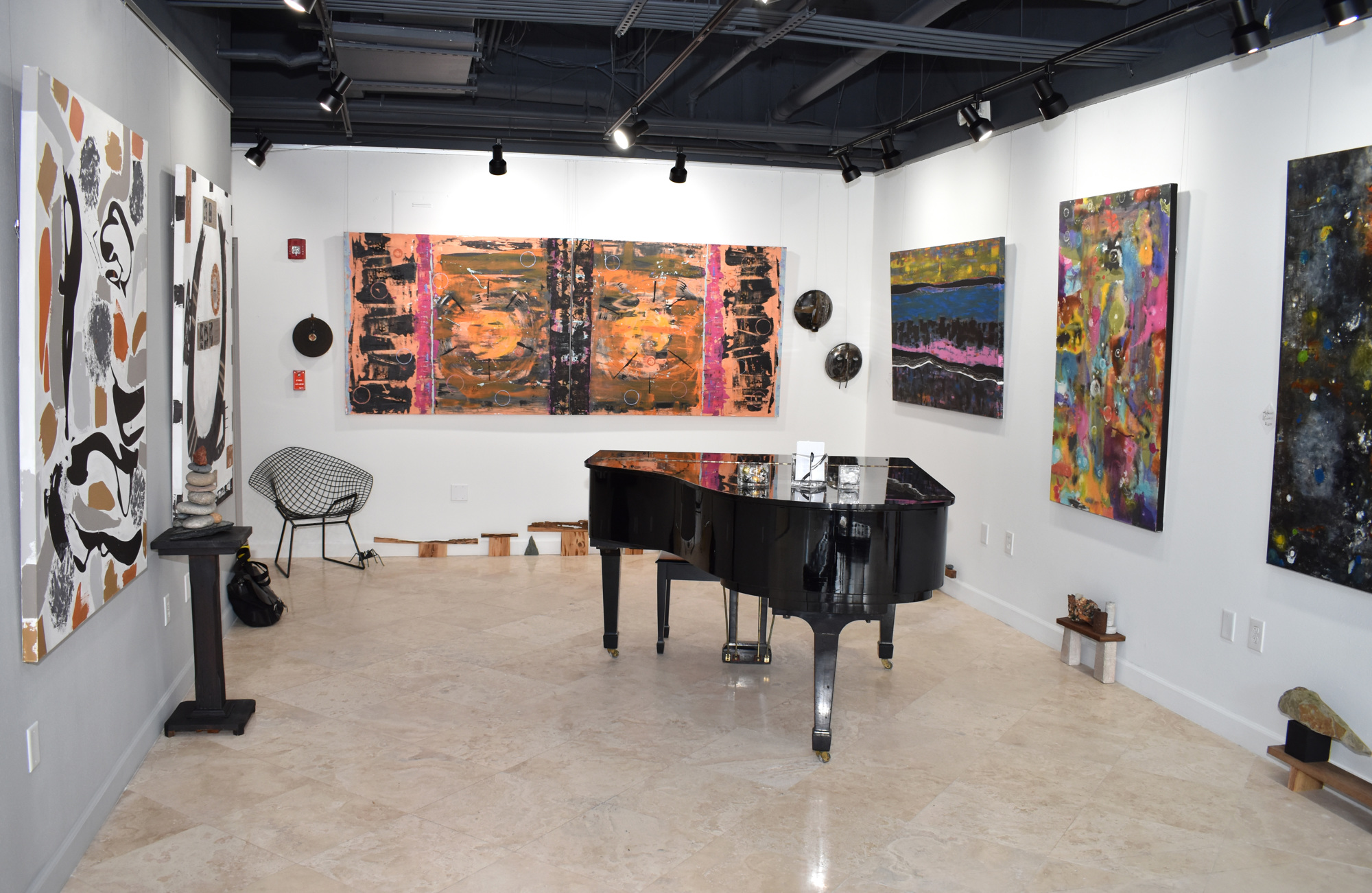 Grace Howl Contemporary Art and Gallery offers both a studio space and this adjoining gallery space, which Howl completes with a unique centerpiece — her grand piano. Photo by Niki Kottmann
