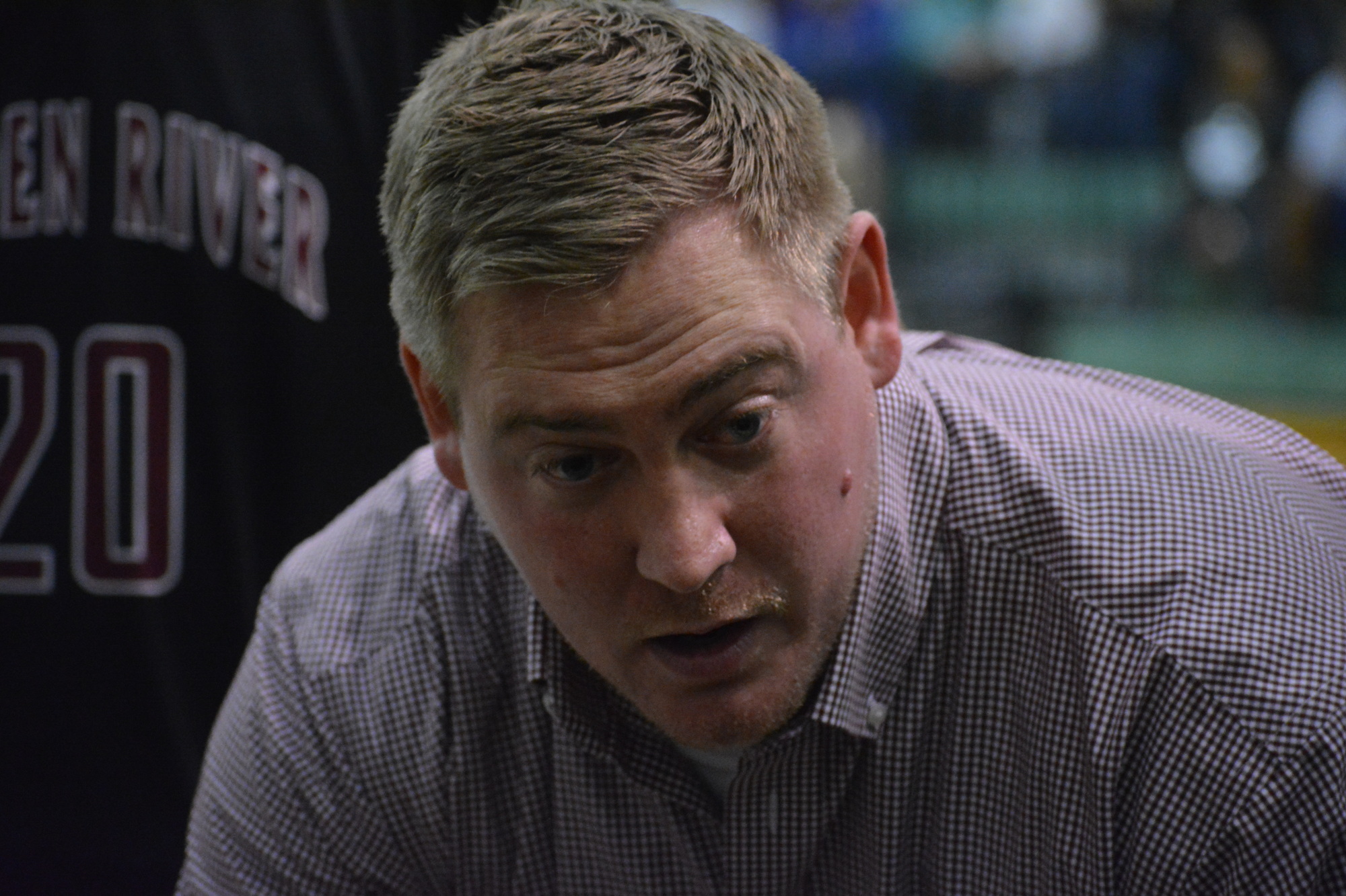 Jason Mickan is balancing the life of a basketball coach and the life of a first-time father.