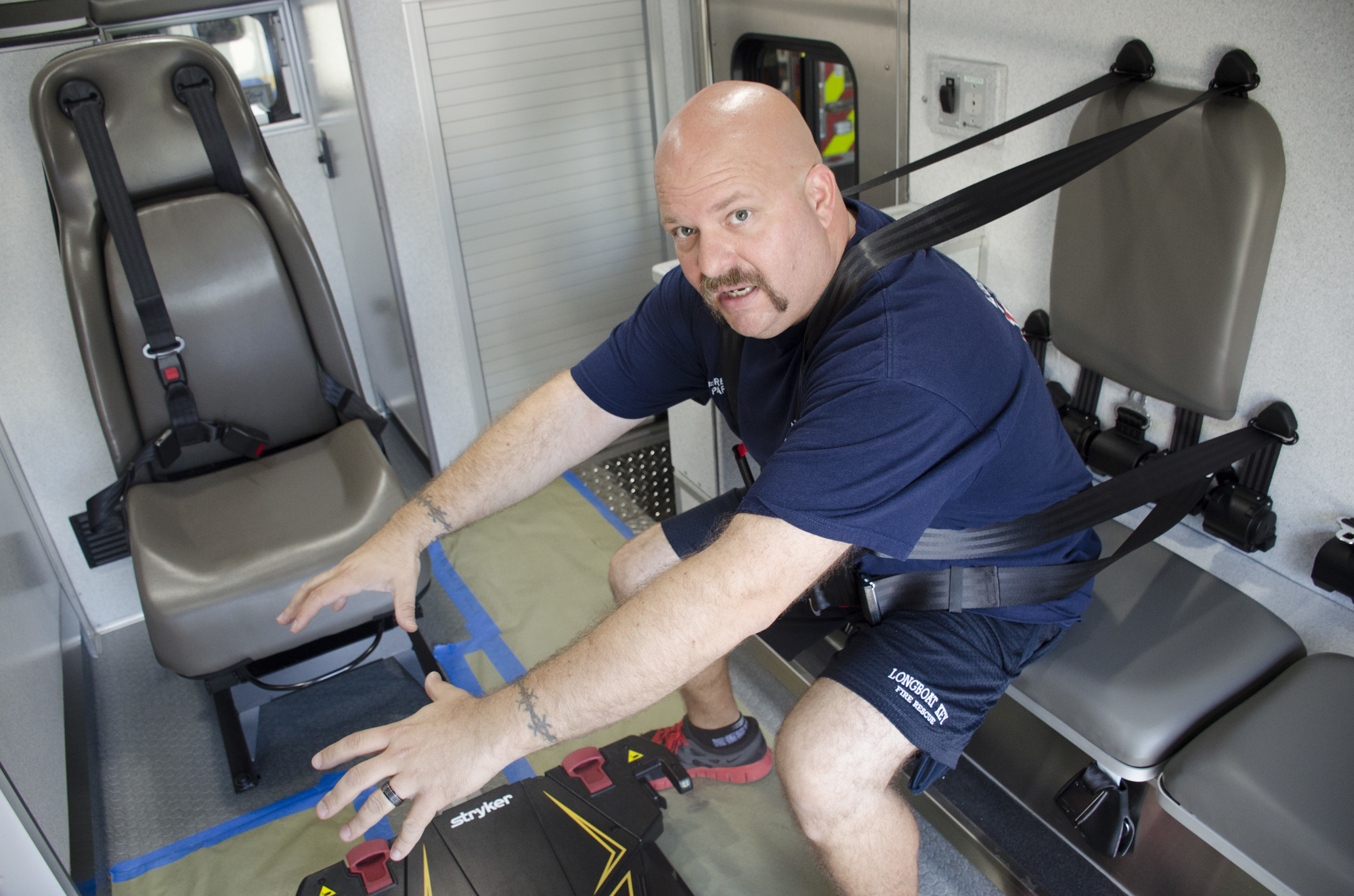These safety straps are designed to give paramedics leverage to reach over and treat patients while staying connected to the vehicle.