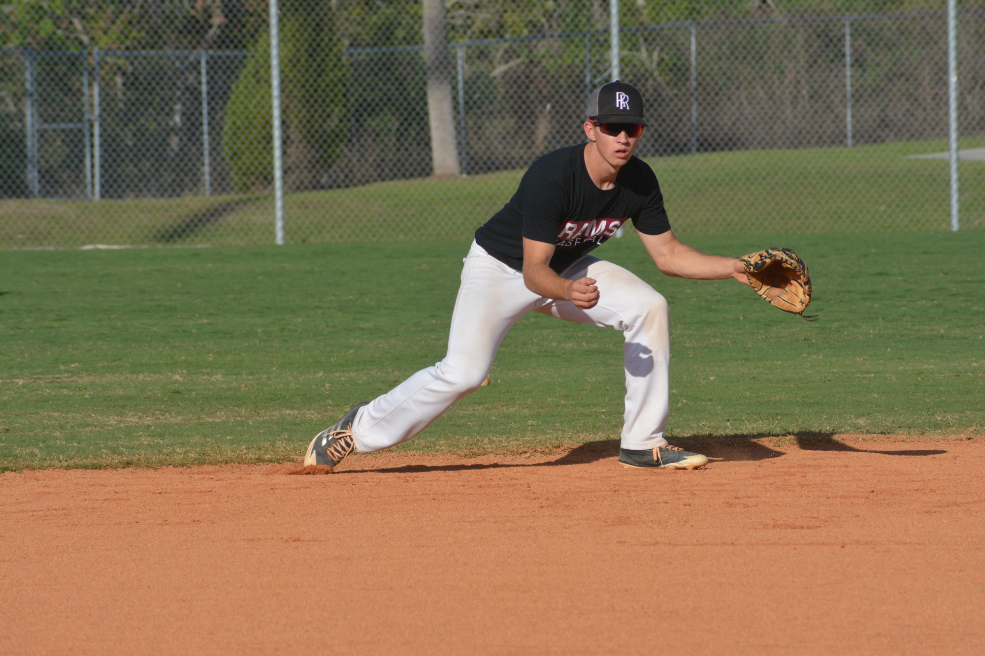 Senior shortstop Kevin Szafran partakes in infield drills at Riverview High practice.
