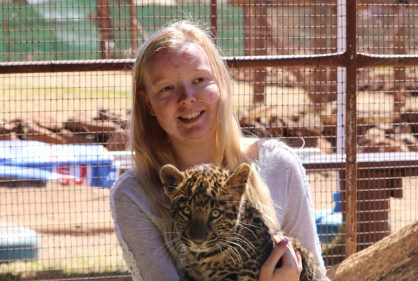 Emily Barley with Zulu the leopard in South Africa.
