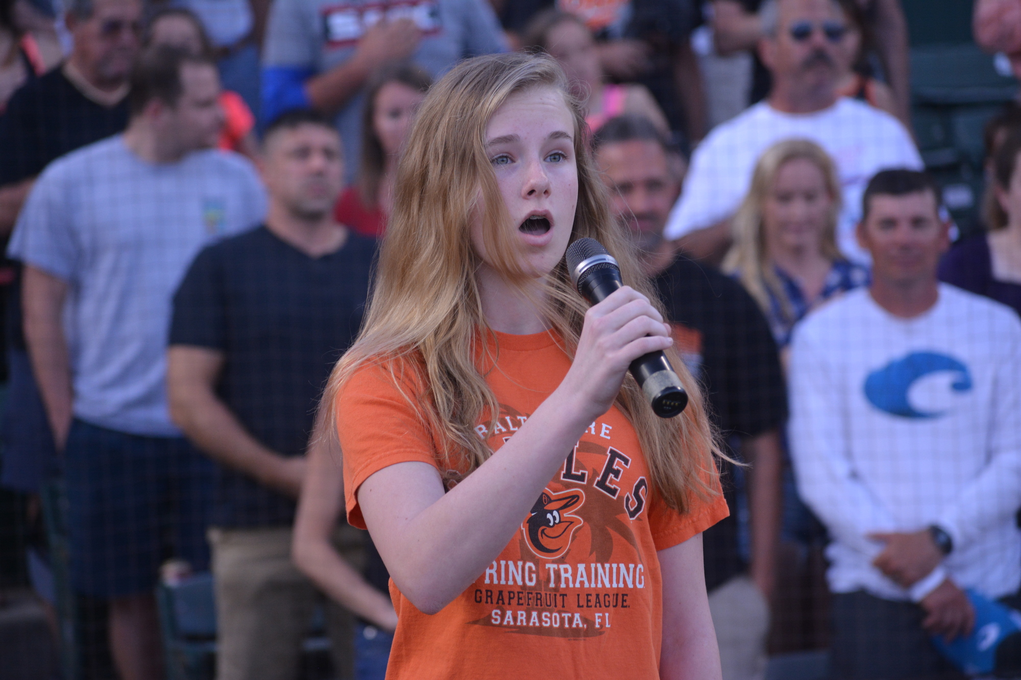 Sarasota High freshman Lizzie Storm sings the National Anthem pregame.