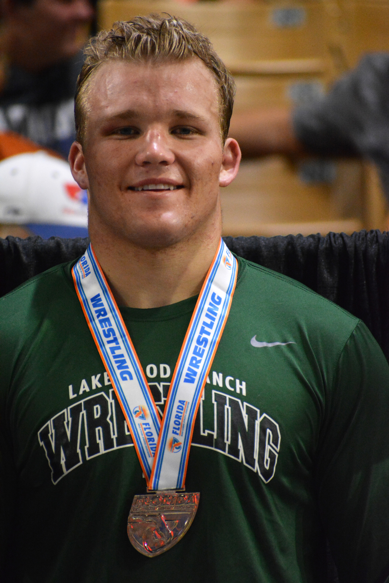 Lakewood Ranch senior Chase Sharp grins after receiving his silver medal.