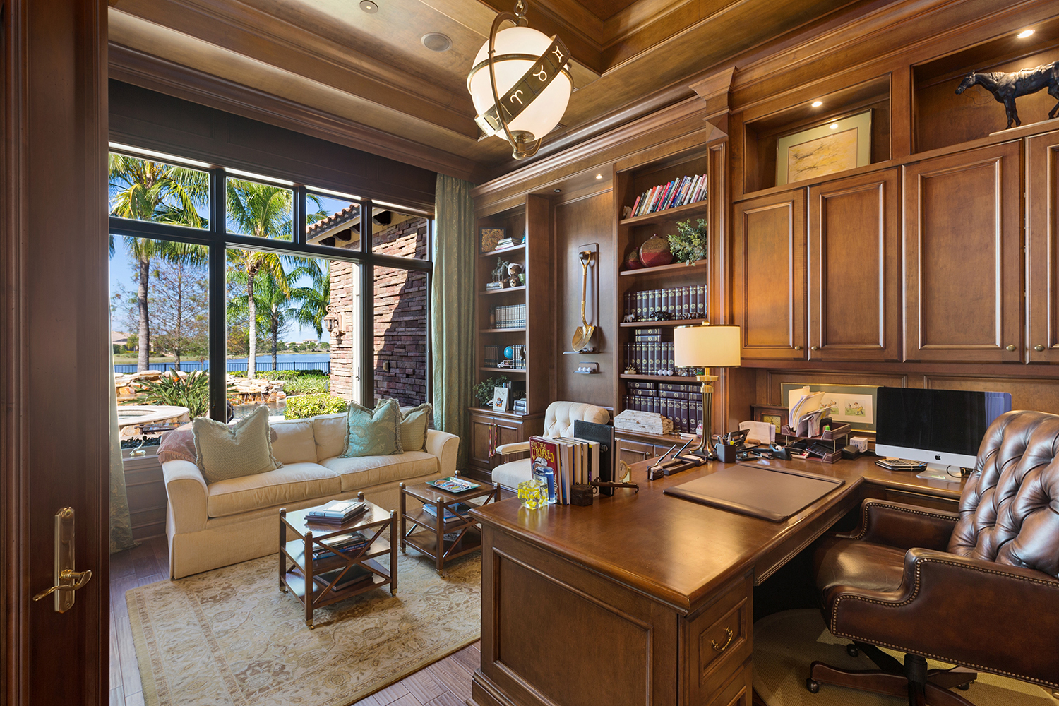 The office is a wood-paneled sanctuary where Randy Mallitz conducts his business and philanthropic activities.