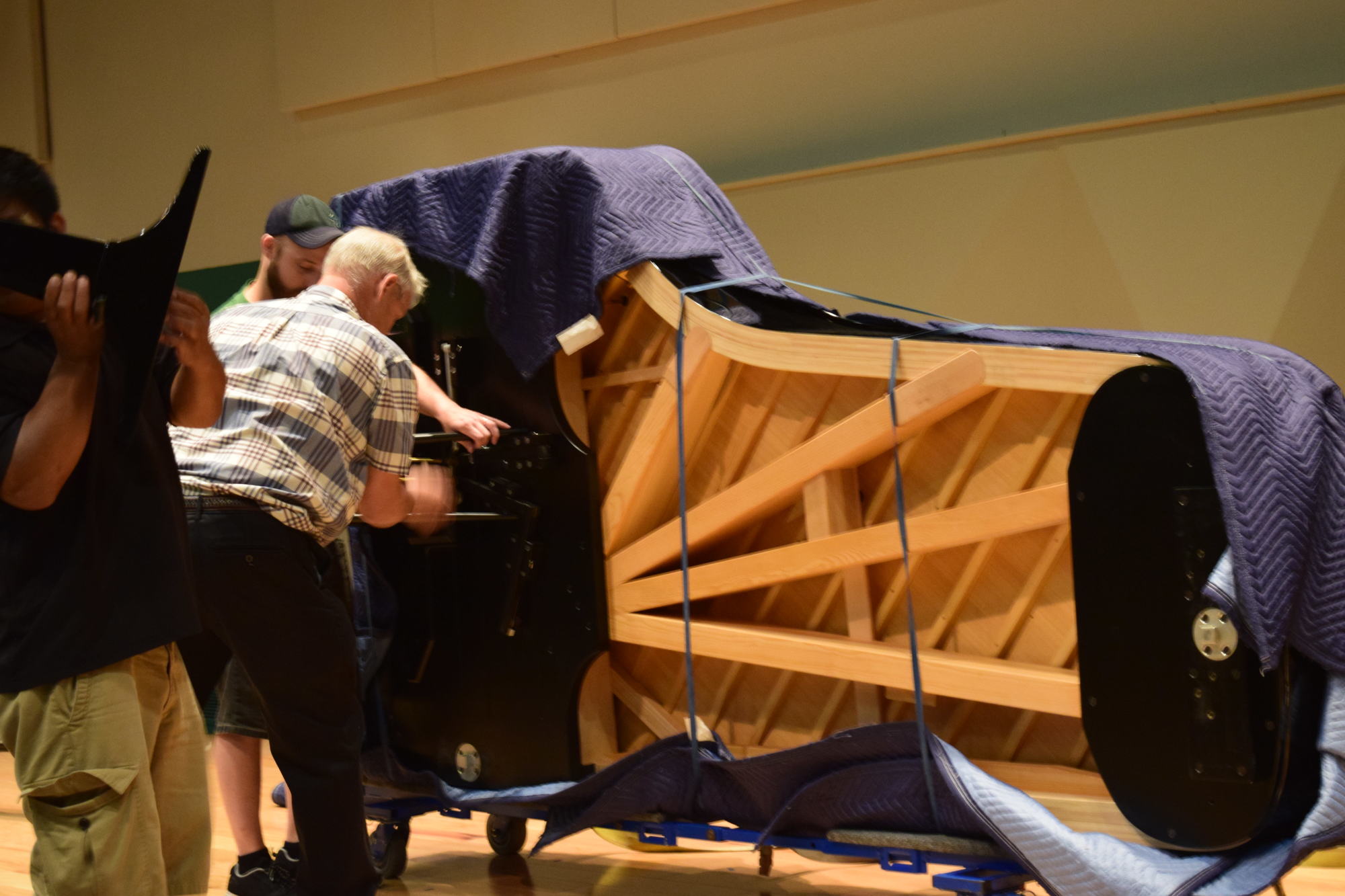 The piano came to Sarasota with its legs detached for safekeeping, so the first step after unwrapping the instrument was to reattach them. Courtesy photo