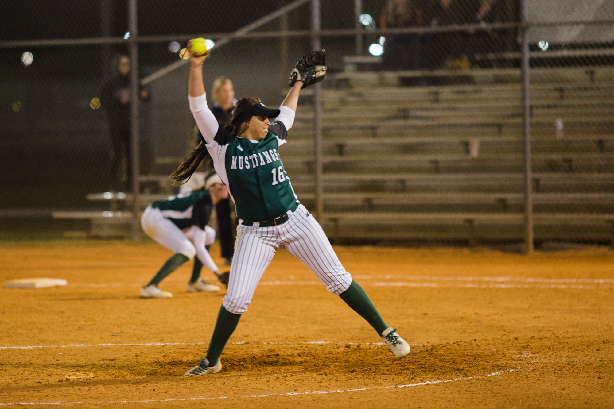 Sophomore Payton Kinney fires a pitch to the plate against Sarasota High. Photo by Kayleigh Omang.