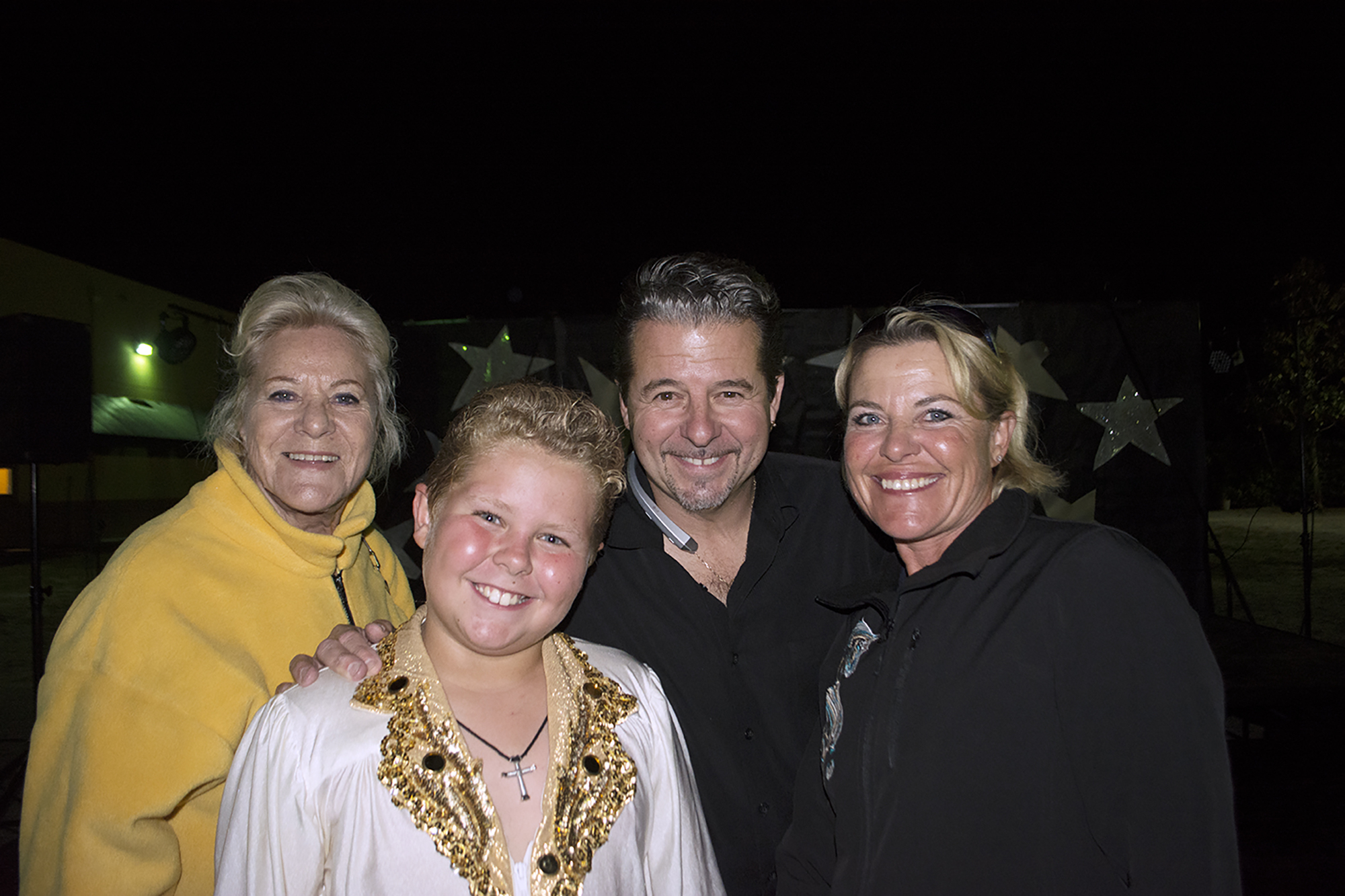 Dominick Bauer, front, poses with his grandmother, Jeanette Williams, father, Joseph Dominick Bauer, and mother, Caroline Williams, after the show.