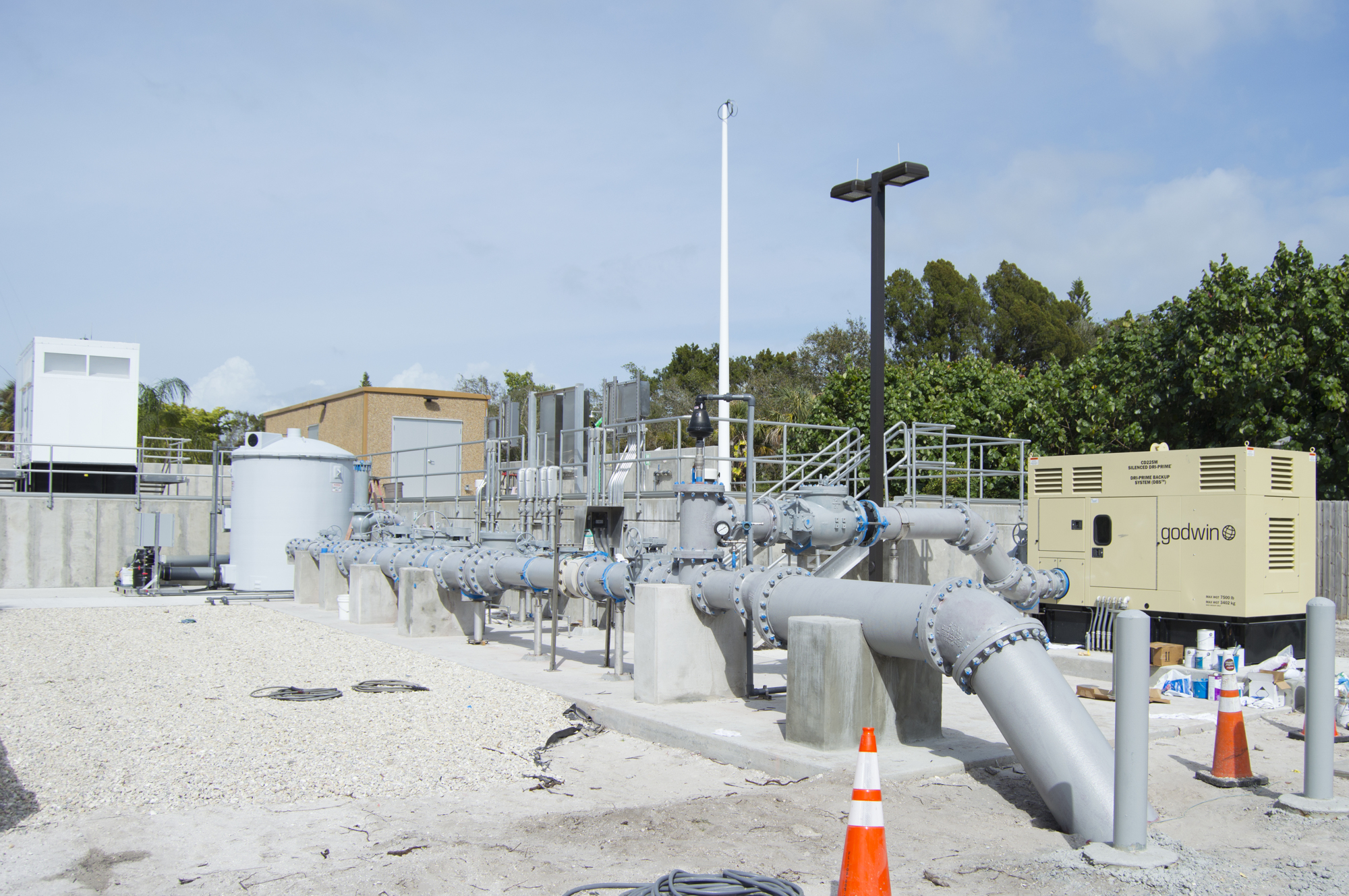 The wastewater treatment facility will be replaced by a pump station, which will transport wastewater to the mainland.