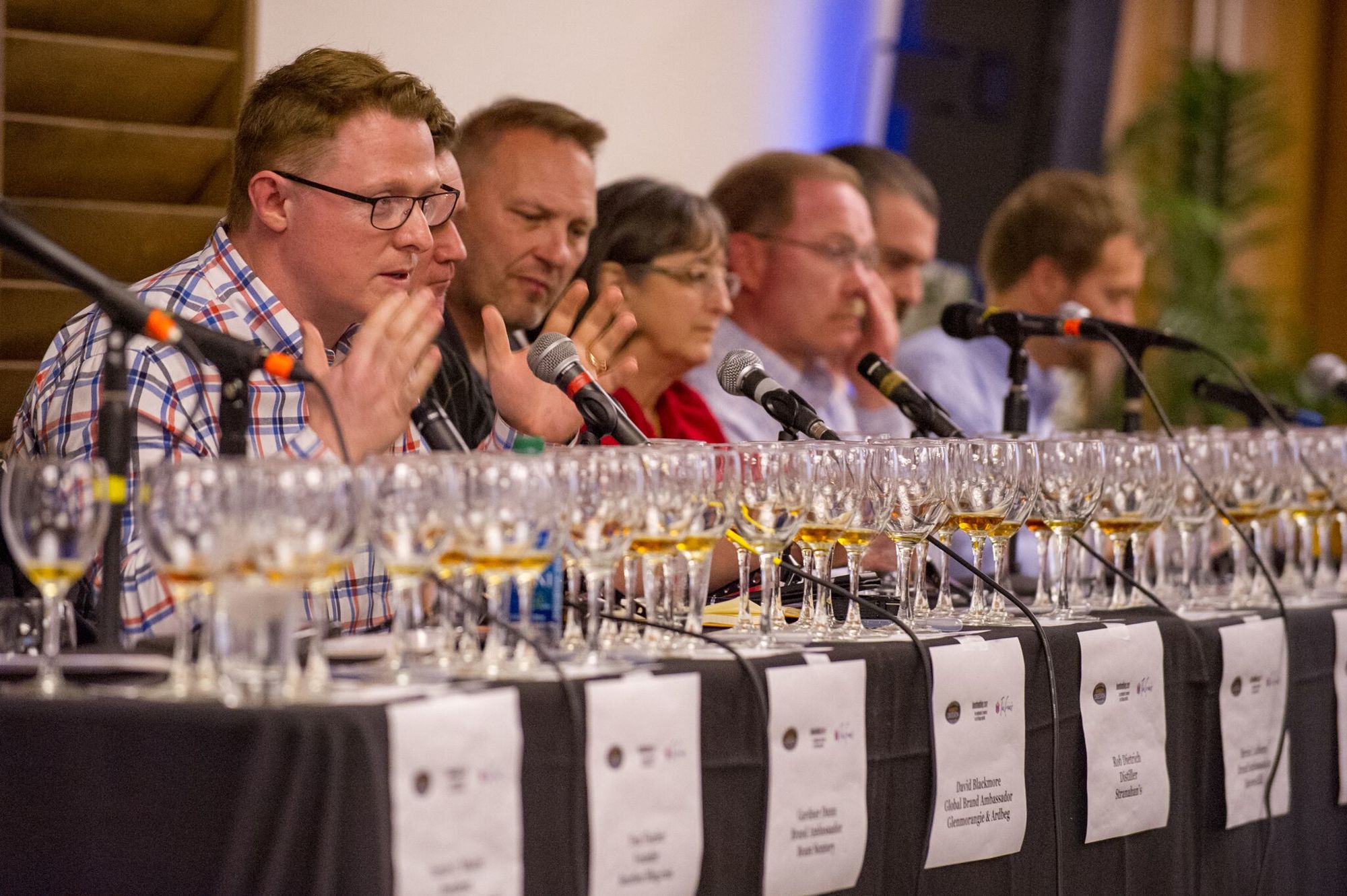 The 2016 Panel of Whiskey Experts discuss the beverage at Whiskey Obsession Festival. Courtesy photo