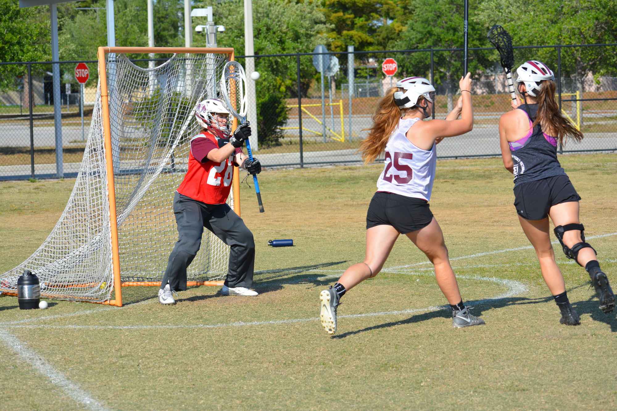 Lindsay Kaighin stops a teammate's shot during a Riverview practice.