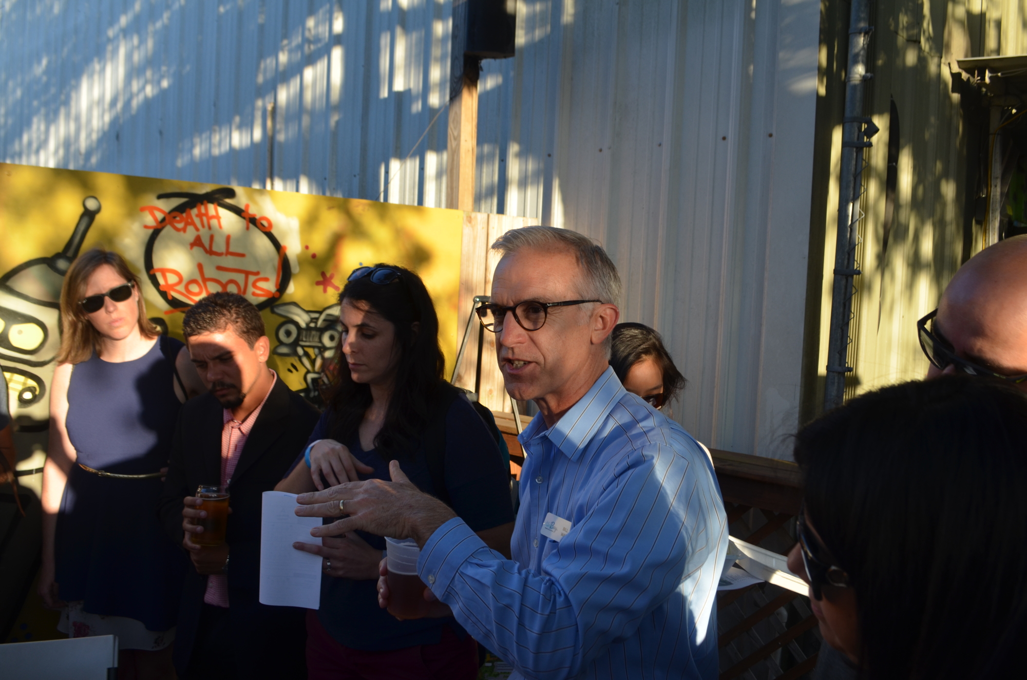 The Bay Managing Director Bill Waddill discusses the bayfront at a Tuesday event targeted at young professionals, hosted at JDub's Brewing Co..