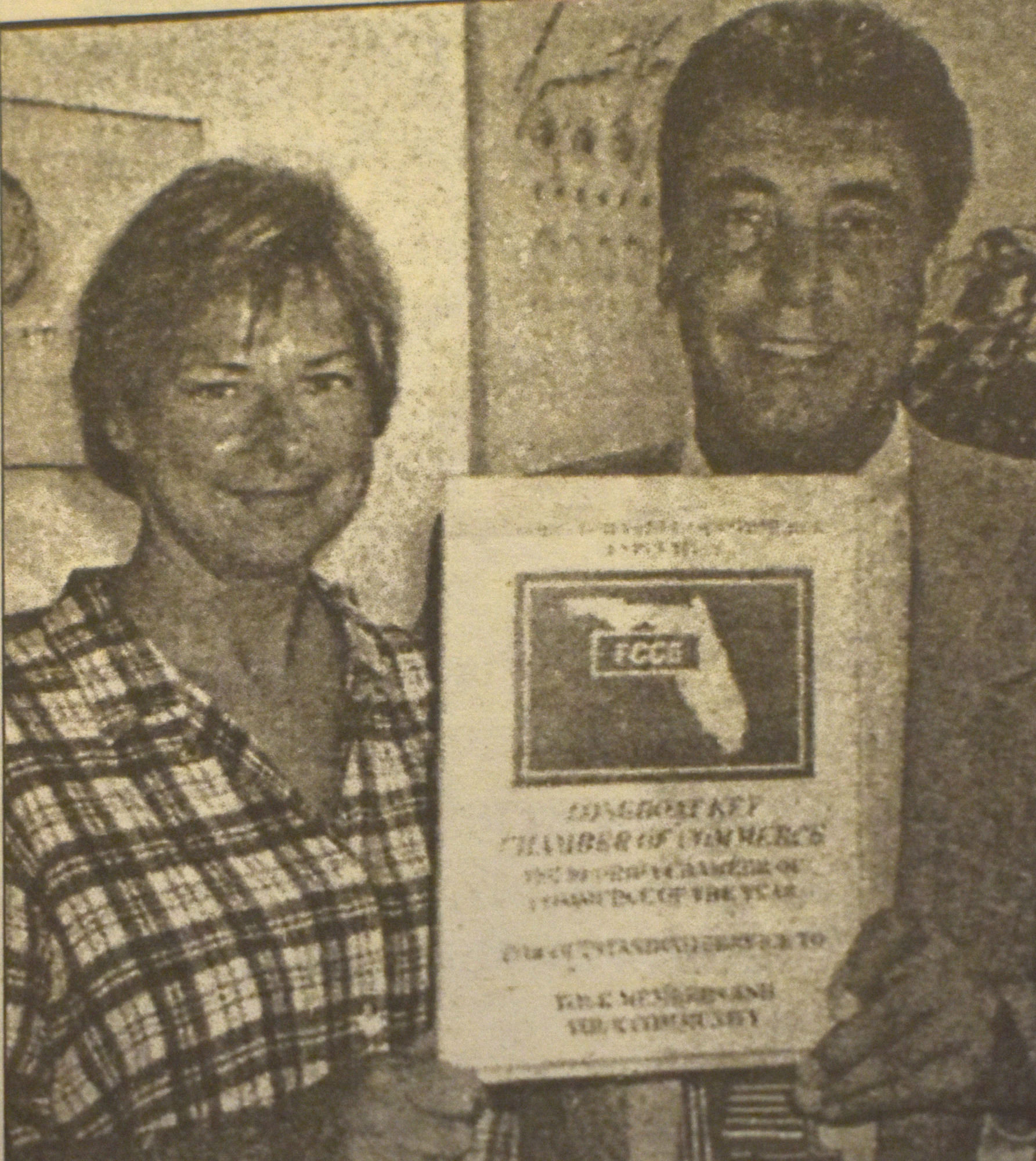 Chamber President Gail Loefgren and Andrew Vac pose with the award naming the Chamber the Best Small Chamber in Florida in 1997. File photo.