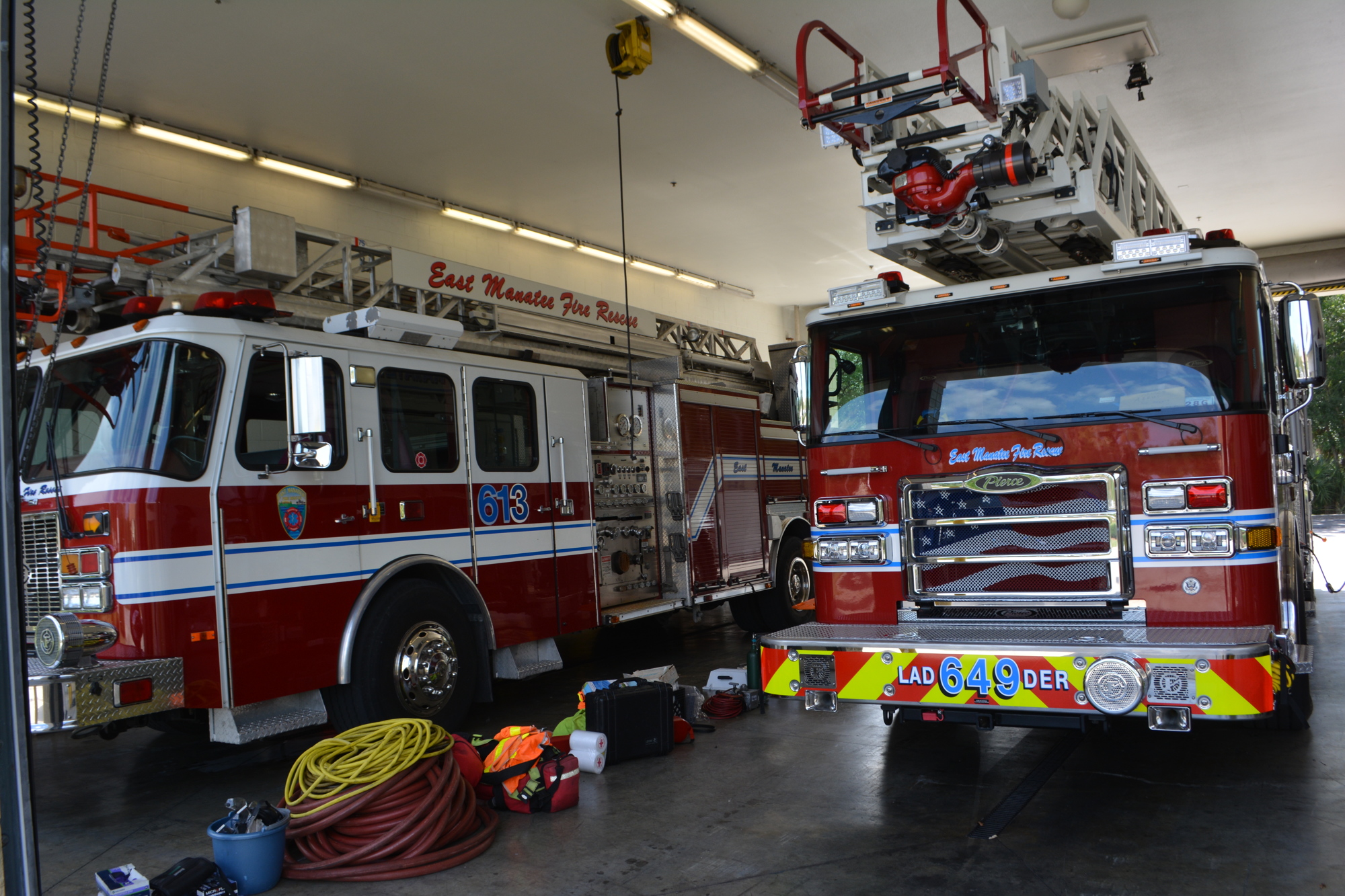 Station 4's old ladder truck (left) reached 75 feet, while the new one (right) reaches 107 feet.