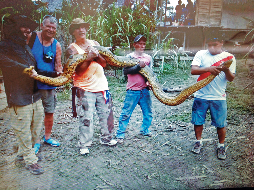 During a recent trip to Peru, Hay and a few brave villagers wrestled an 18-foot anaconda  out of a water pit in the Amazon basin.