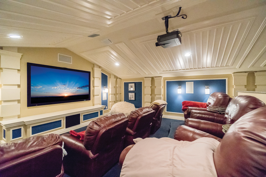 The home theater is the perfect spot for Netflix and football games. There are seven leather recliners, a snack bar, and a mini-kitchen.