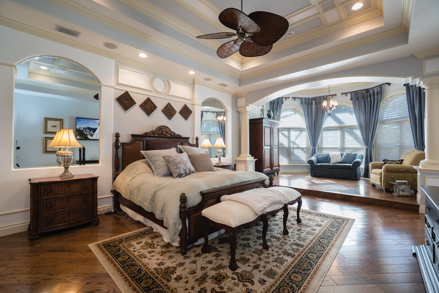 The master bedroom features a raised  seating area.