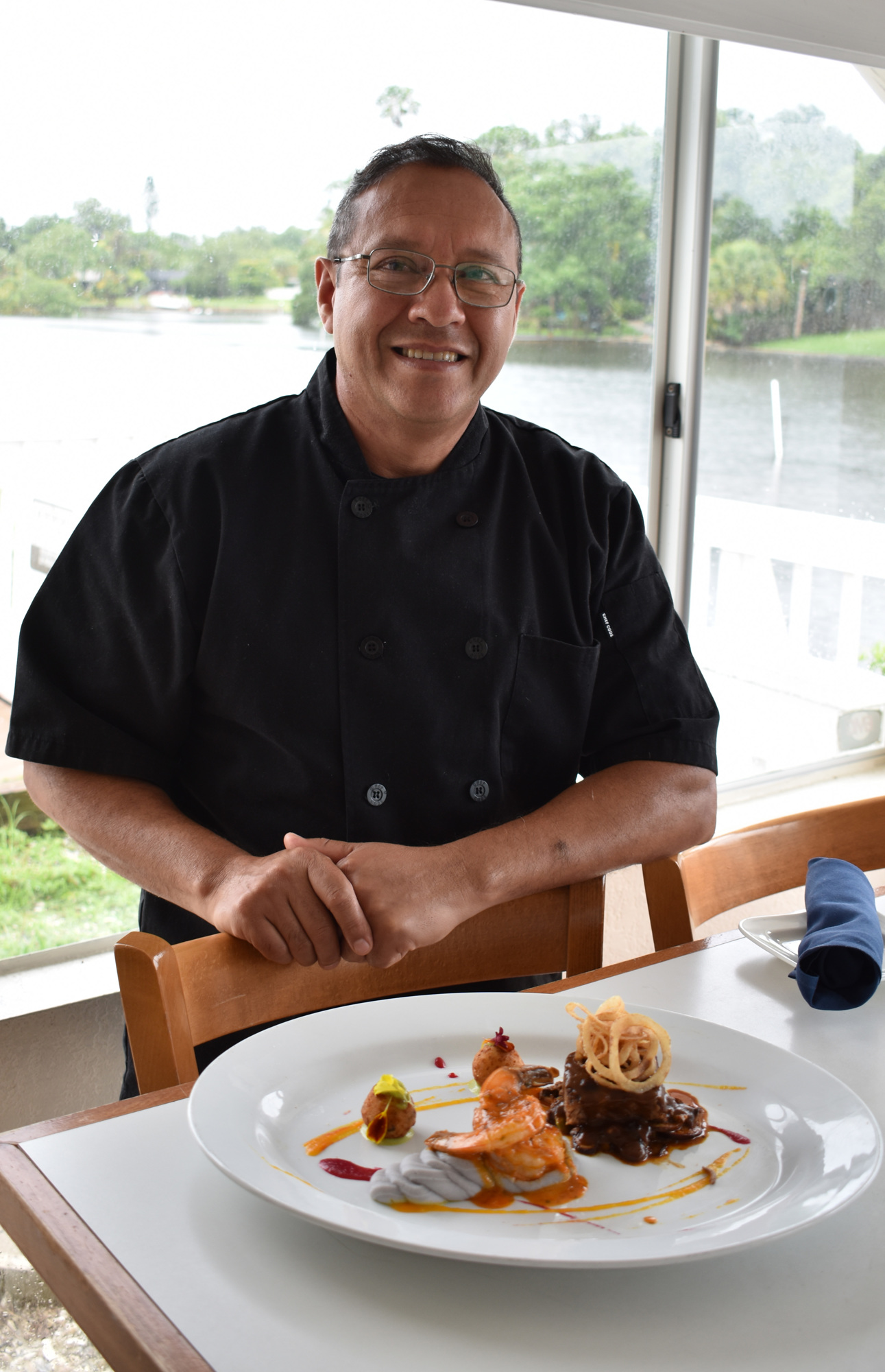 Chef Pedro Flores says the puebla land and sea dish is another one of his favorites because it combines fresh seafood with oven-roasted beef. Photo by Niki Kottmann