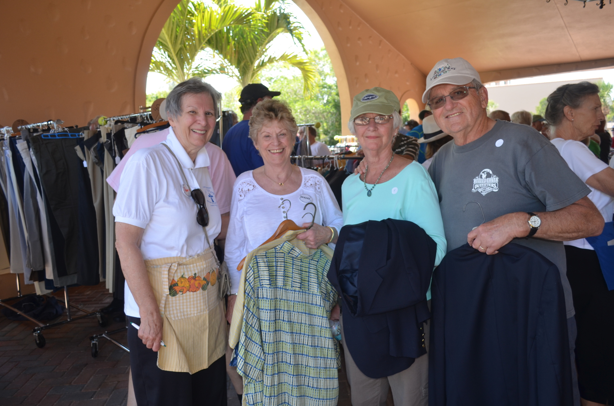 Annette Hogan, Deirdre Schueppert and Cynthia and Stan Slater shop at last year's St. Mary's Rummage Sale.