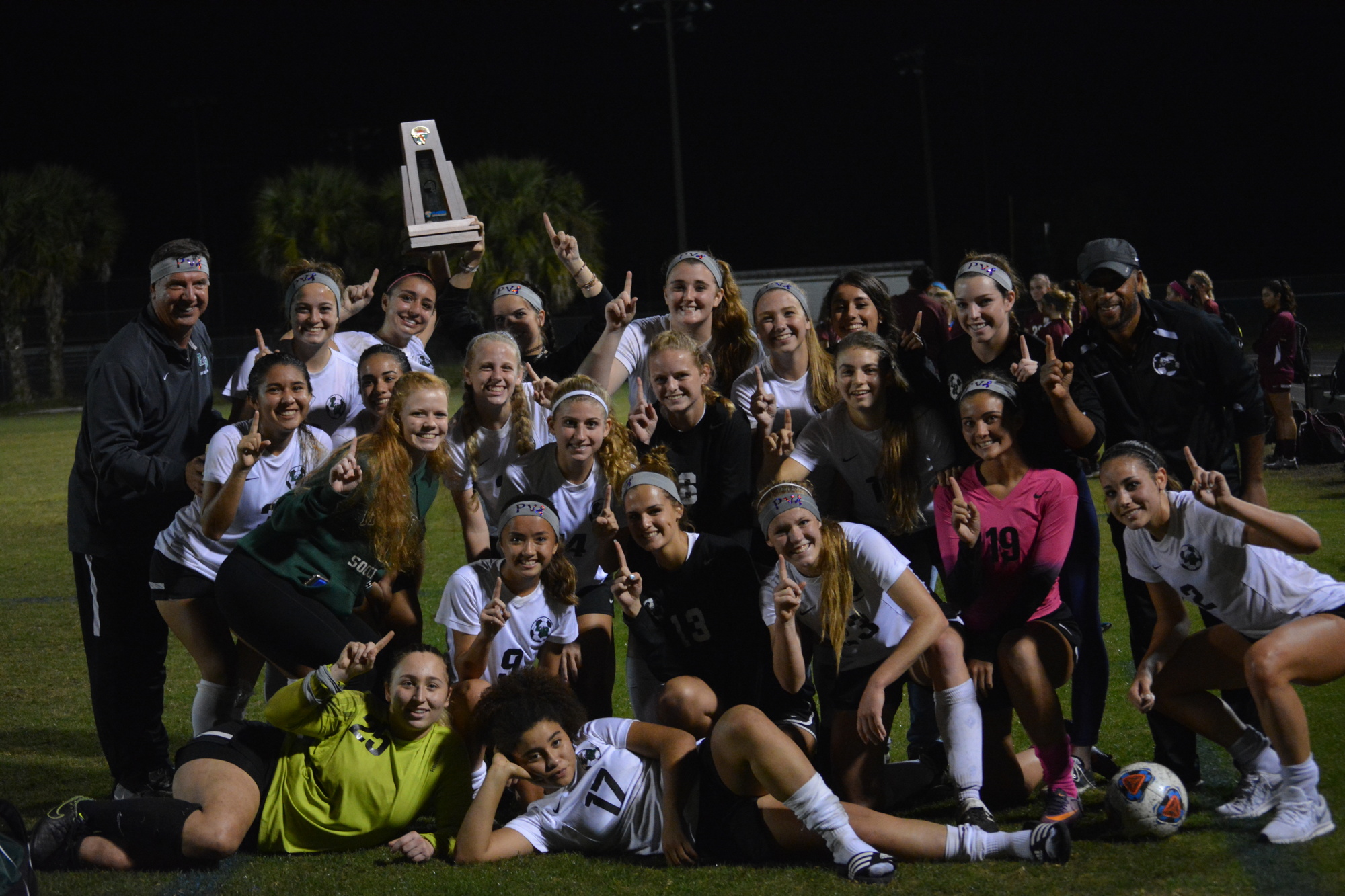 Guy Virgilio and his Lakewood Ranch girls soccer team celebrate the Class 5A District 8 title.
