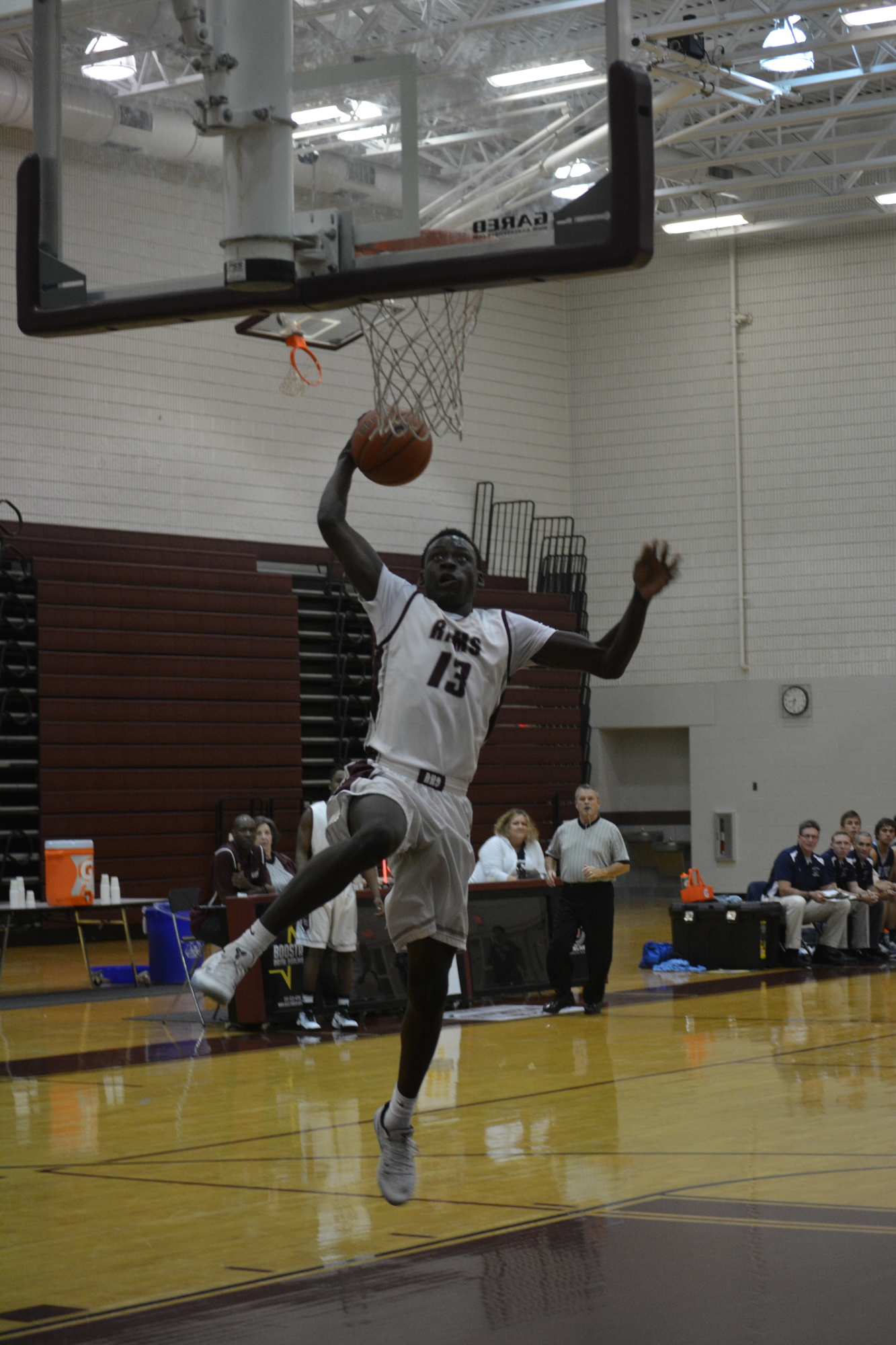 Malachi Wideman jumps for a one-handed slam against North Port.