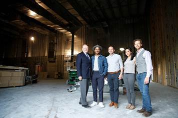 Ringling President Dr. Larry R. Thompson, Actor André Holland, Joseph Restaino and Wey Lin of the Sunscreen Film Festival and Ringling College Studio Lab Producer Tony Stopperan touring Ringling College’s soundstage.