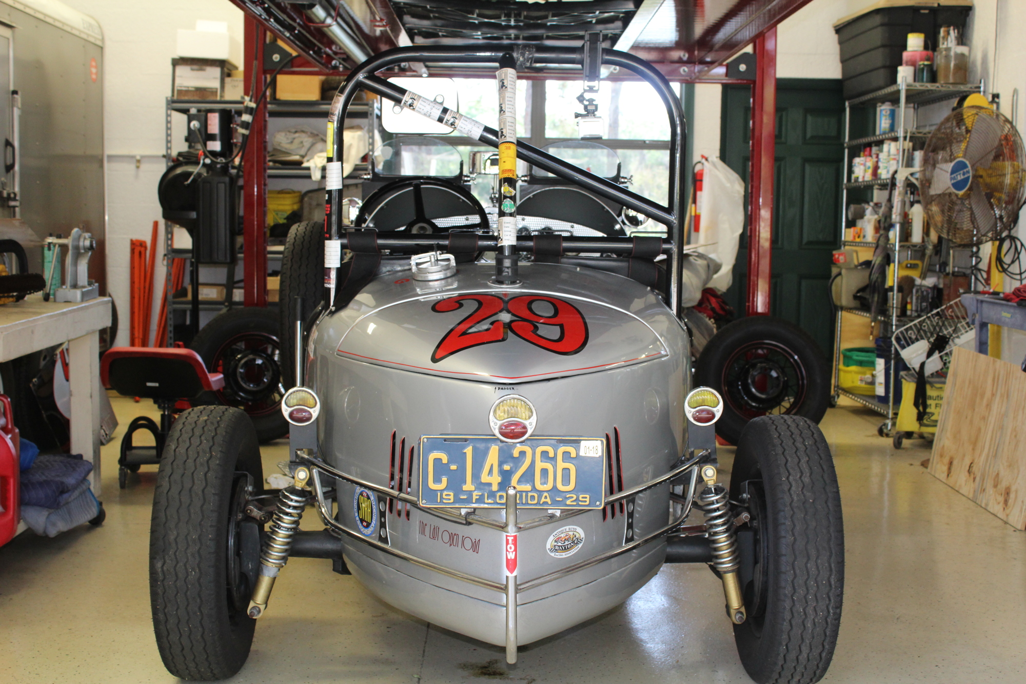 Braden Woods’ William Stelcher’s Ford Speedster sits in his auto shop that he had built on his property.