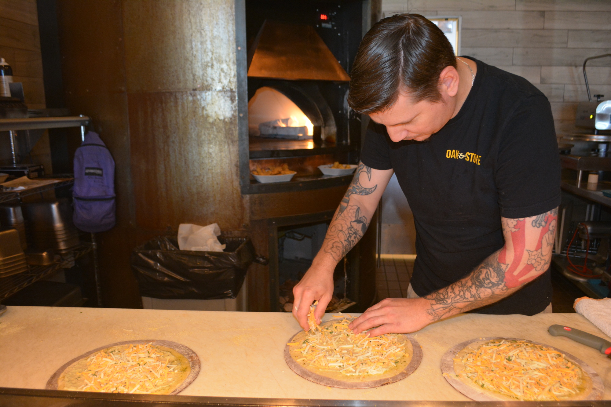 Head chef Mike Yoder tries to put his personal spin on the Oak & Stone menu.