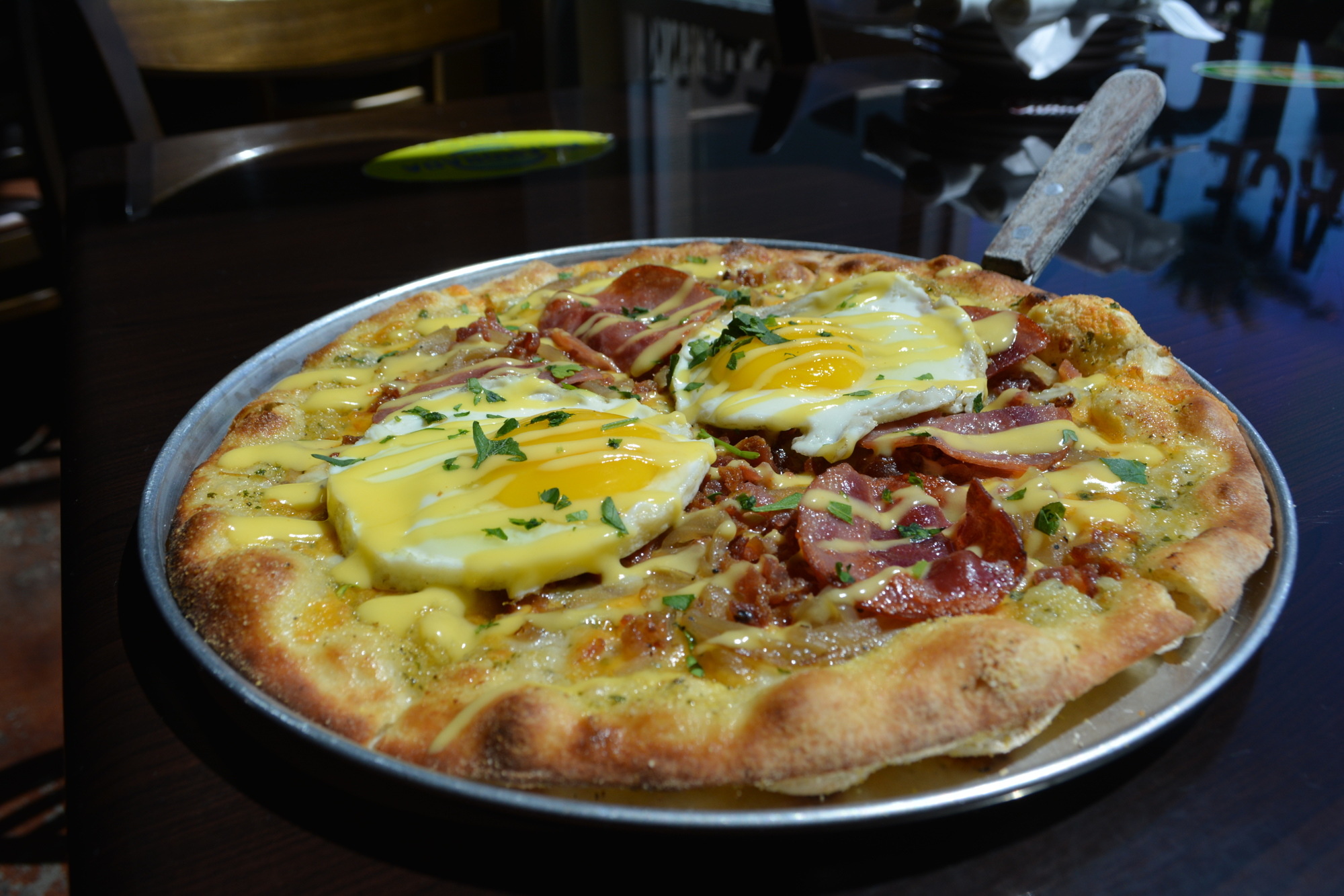 Eggs on pizza? The Benedict has become so popular it was added to the regular menu.