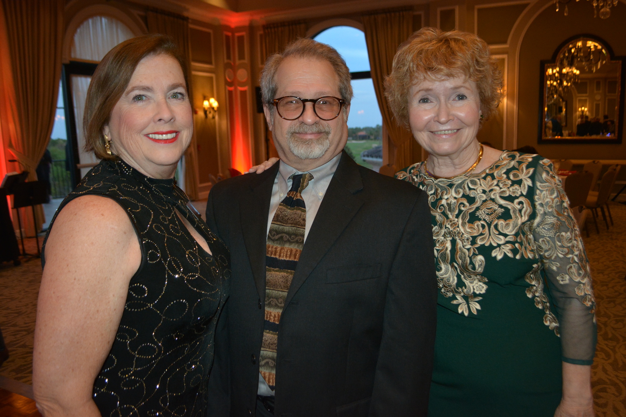 Players Chair Donna DeFant visits with Elliott Raines of Two Chairs Theatre Company and Pam Wiley, a Players director, during a fundraiser Feb. 10 at Lakewood Ranch Country Club.