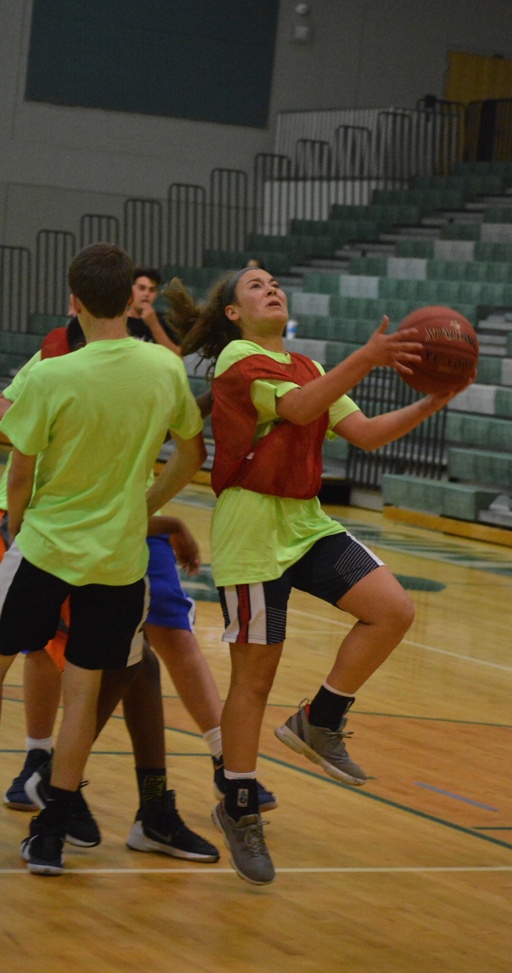 Olivia Davis hits a layup at Lakewood Ranch's summer basketball camp.