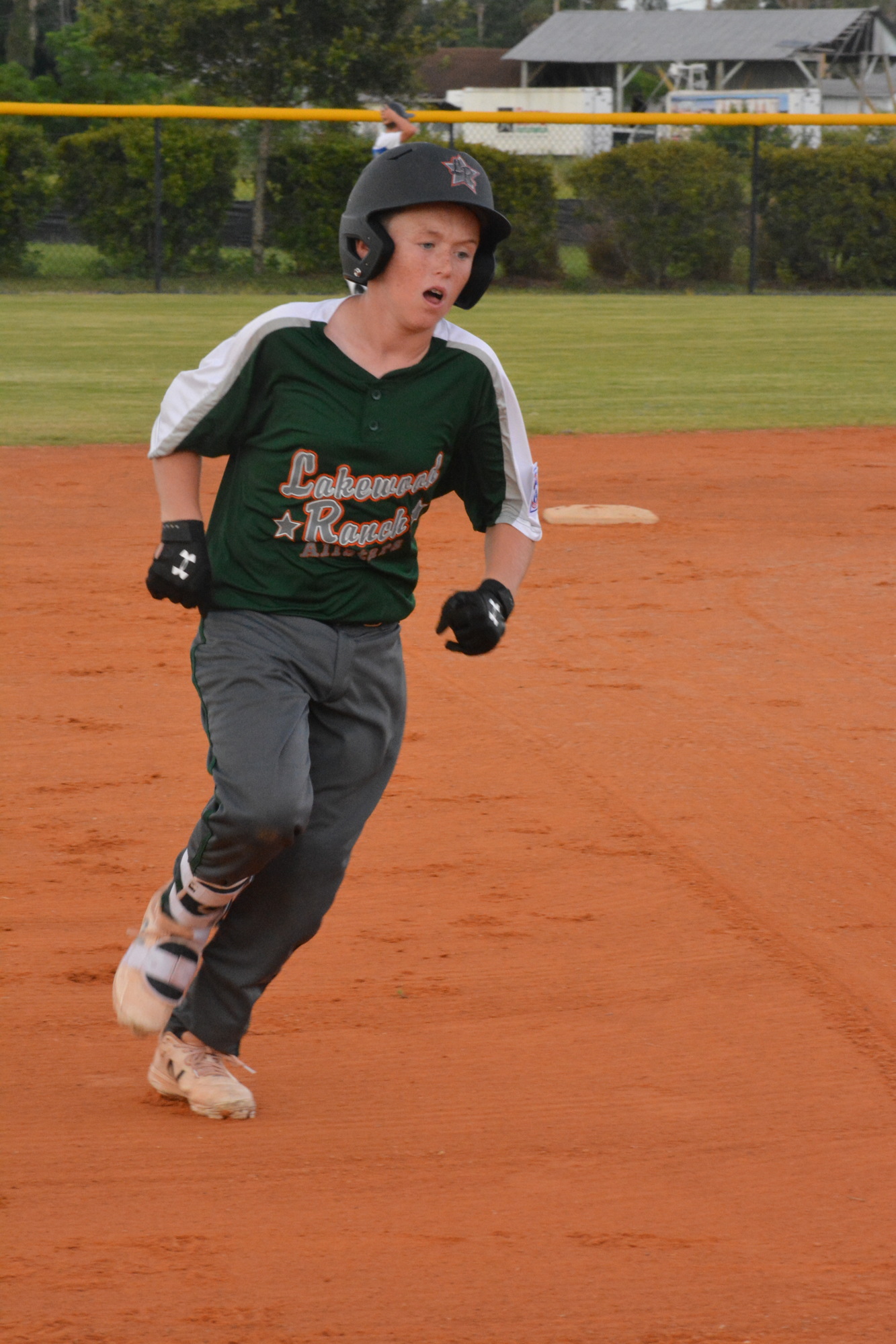 Lakewood Ranch catcher Andy Schroeder rounds the bases after hitting a two-run home run in the first inning against Buffalo Creek.