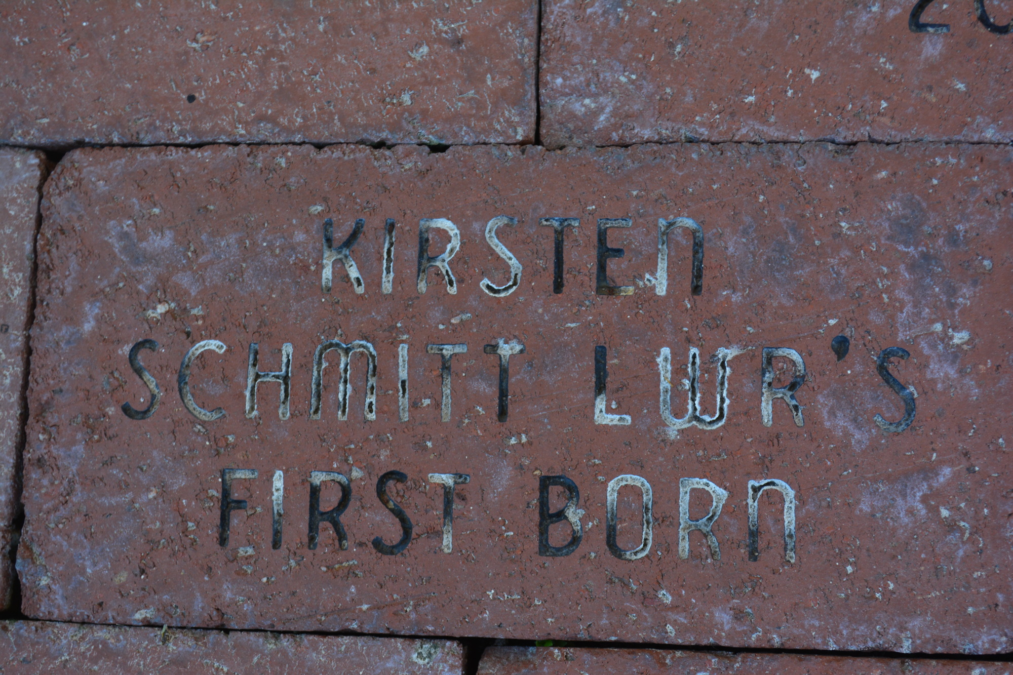 In case you didn't know it, a brick in front of Lakewood Ranch Town Hall, which was dedicated in 2004, let's everyone know Kirsten Schmitt was Lakewood Ranch's first baby. Photo by Jay Heater