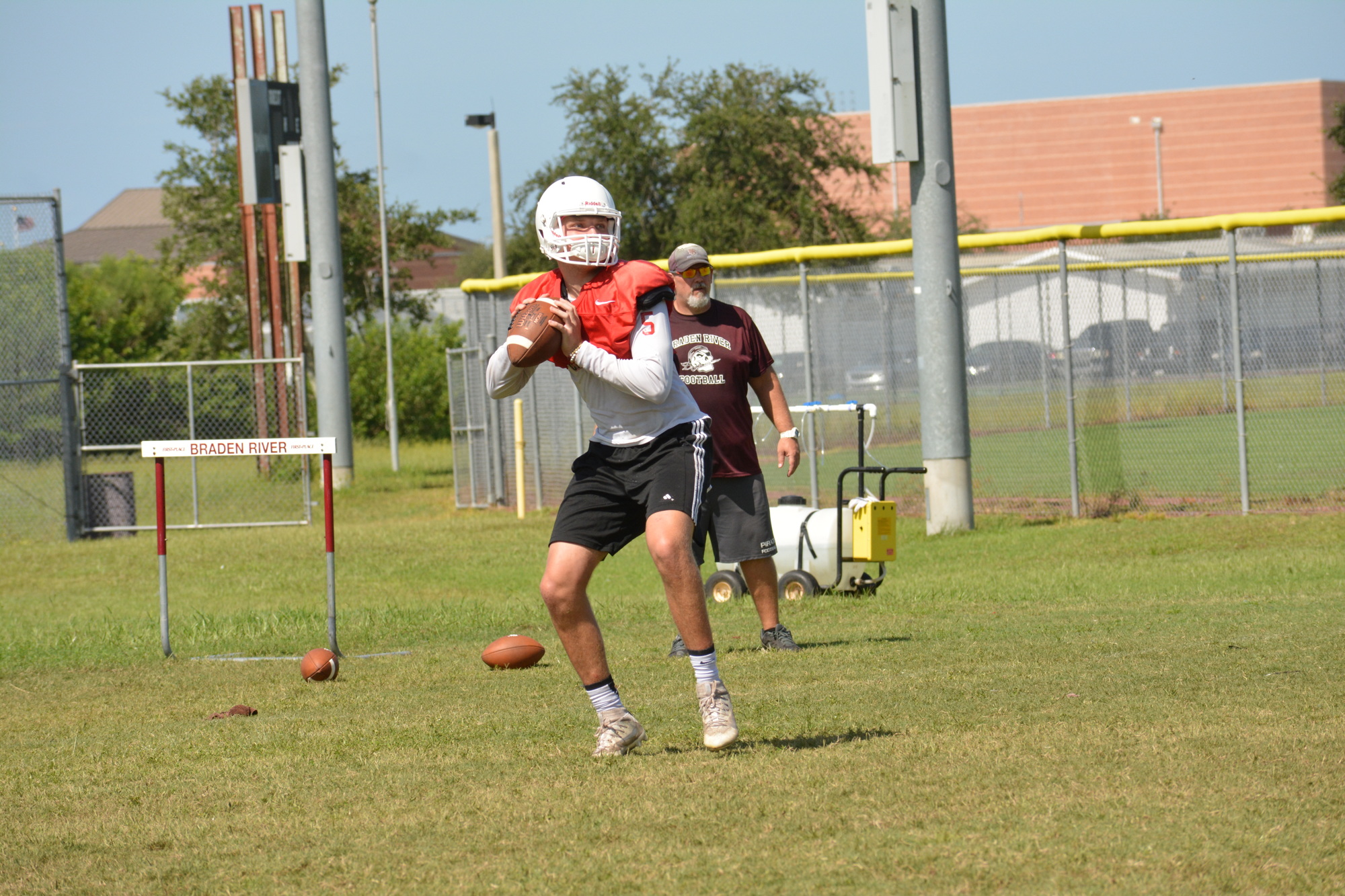 Braden River quarterback Bryan Gagg looks to launch a pass during practice.