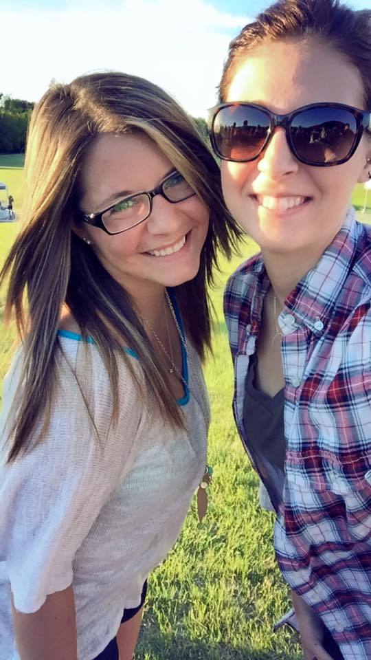 My friend, Alexis Tschosik, and I at a country concert in my flannel.
