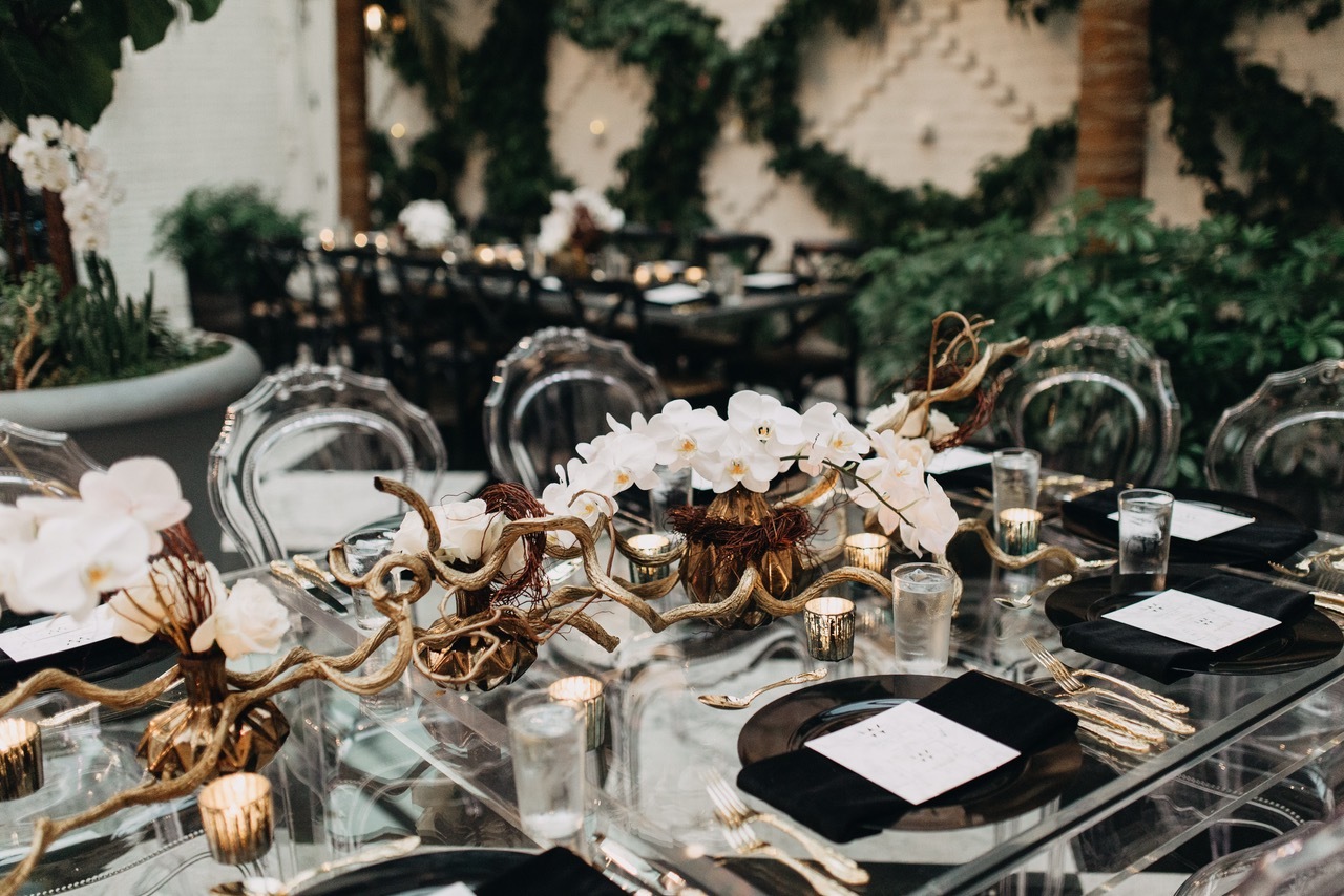 Jennifer Matteo Event Planning planned a mostly black and white wedding with greenery. Photo courtesy of Katelyn Prisco Photography