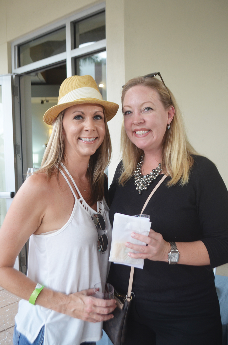 Lakewood Ranch’s Holly Sharma and Jill Gartman say they stopped at some Main Street shops for the first time during Wine Walk Wednesday.