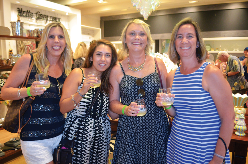 Lakewood Ranch’s Lisa Holler, Annie Talbert, Michelle Hardin and Traci Kundrat enjoy one of the stops on Wine Walk Wednesday.
