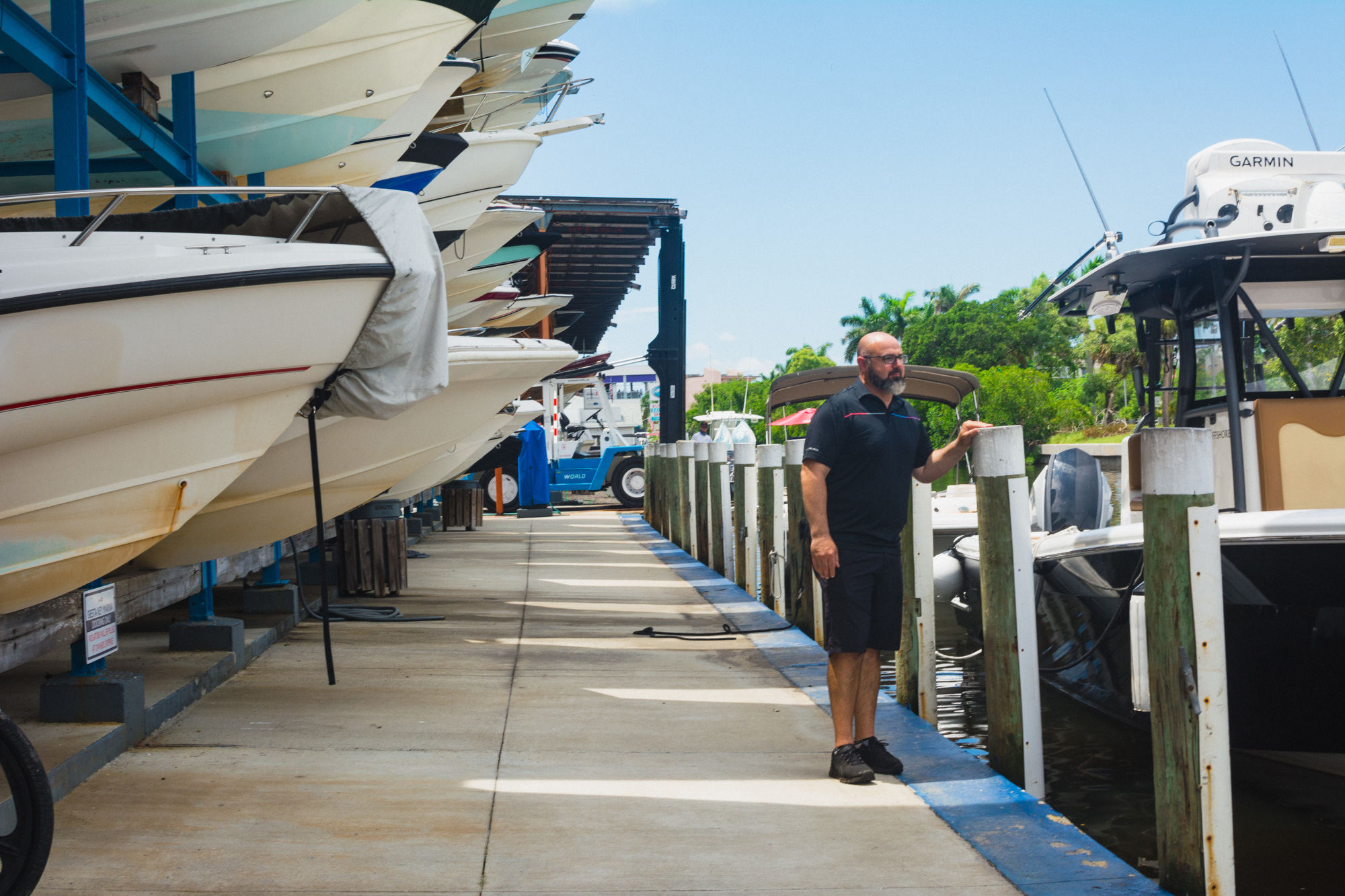 Siesta Key Marina owner Maurice Dentici observes the waters conditions. He has experienced a 60% sales loss compared to last month.